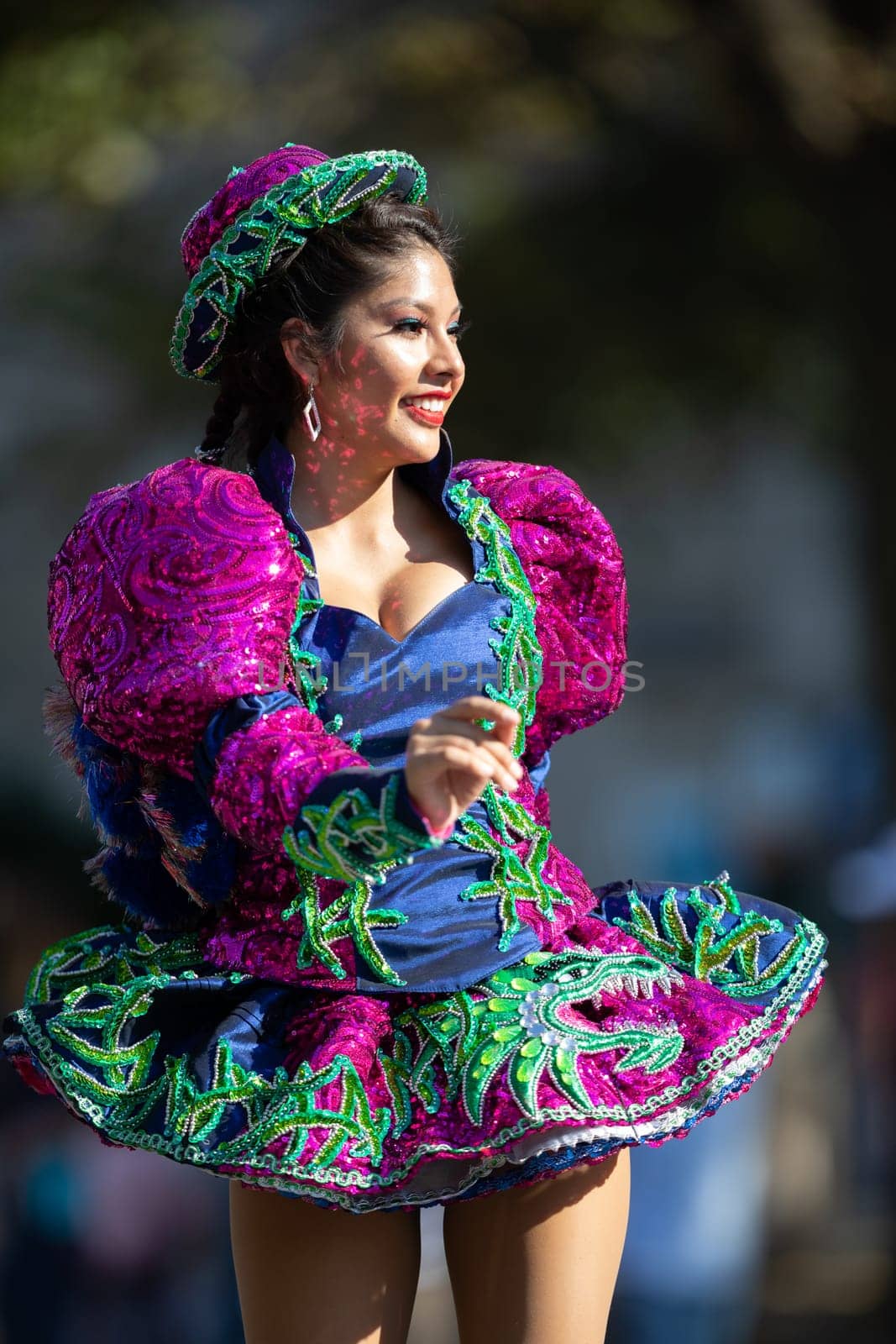 Washington, D.C., USA - September 29, 2018: The Fiesta DC Parade, Bolivian women wearing traditional clothing performing a traditional dance from bolivia