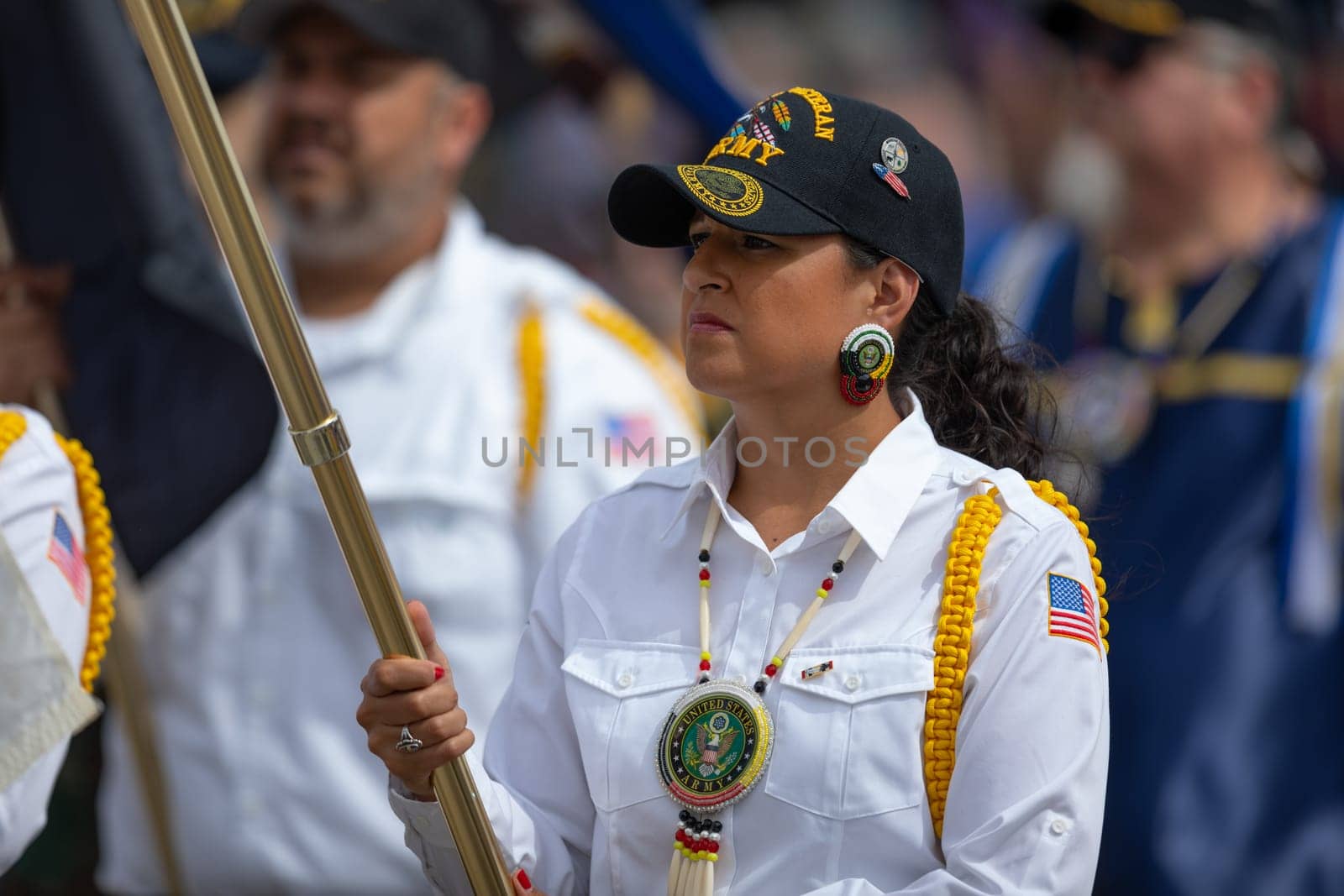 Milwaukee, Wisconsin, USA - September 8, 2018 The Indian Summer Festival, Men and women wearing traditional native american clothing in the ceremony honoring native american military veterans