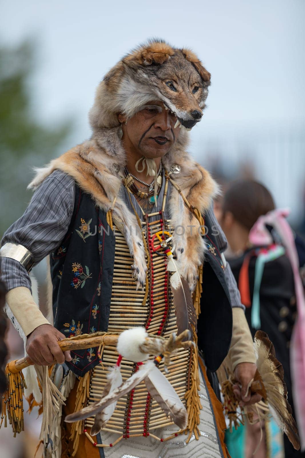 Milwaukee, Wisconsin, USA - September 8, 2018 The Indian Summer Festival Man wearing traditional native american clothing at the pow wow competition.
