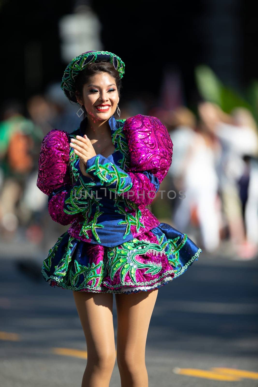 Washington, D.C., USA - September 29, 2018: The Fiesta DC Parade, Bolivian women wearing traditional clothing performing a traditional dance from bolivia