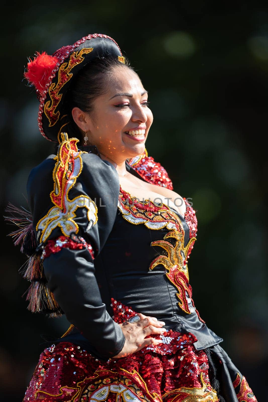 Washington, D.C., USA - September 29, 2018: The Fiesta DC Parade, Bolivian women wearing traditional clothing performing a traditional dance from bolivia