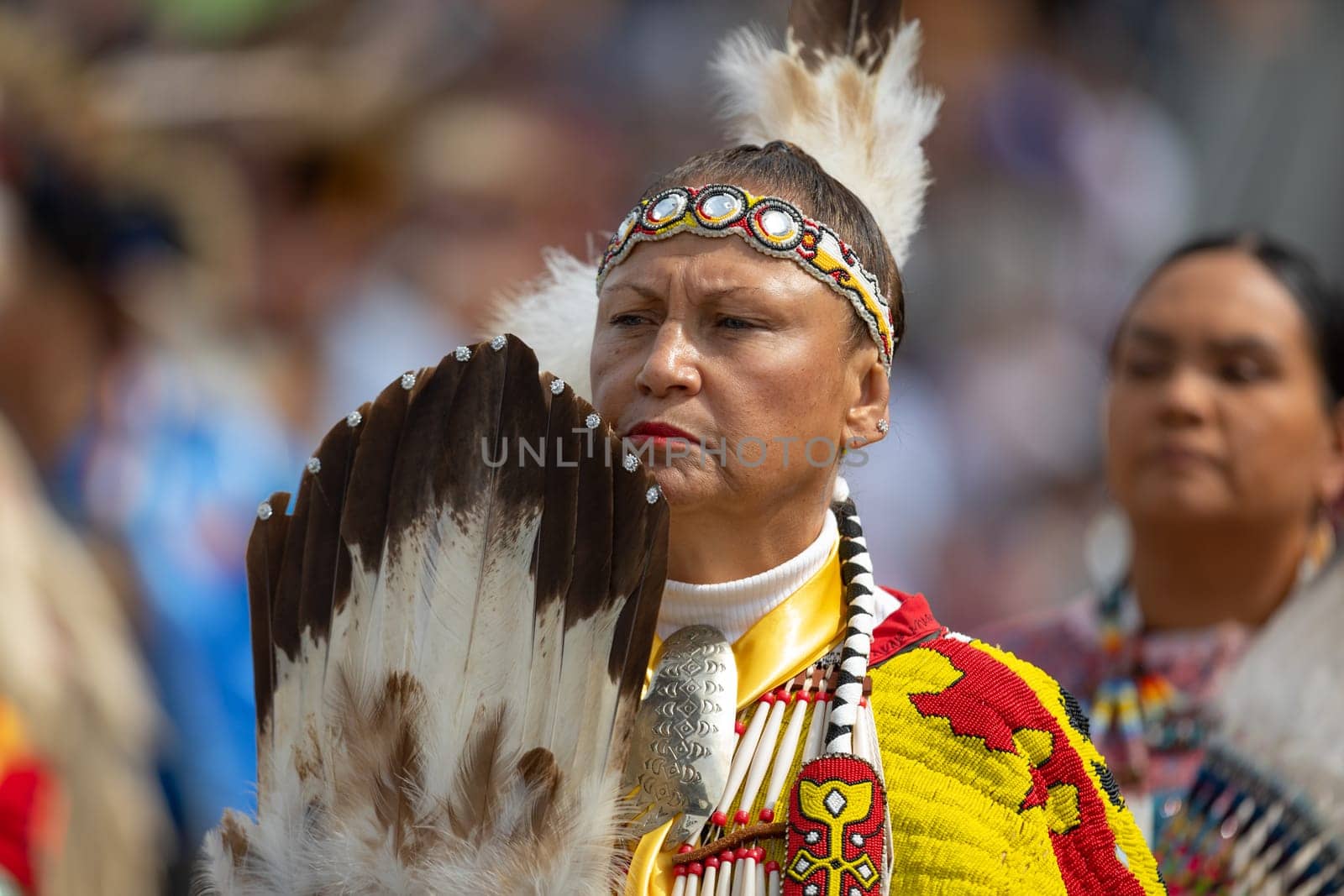 Milwaukee, Wisconsin, USA - September 8, 2018 The Indian Summer Festival, Woman wearing traditional native american clothing at the pow wow competition.