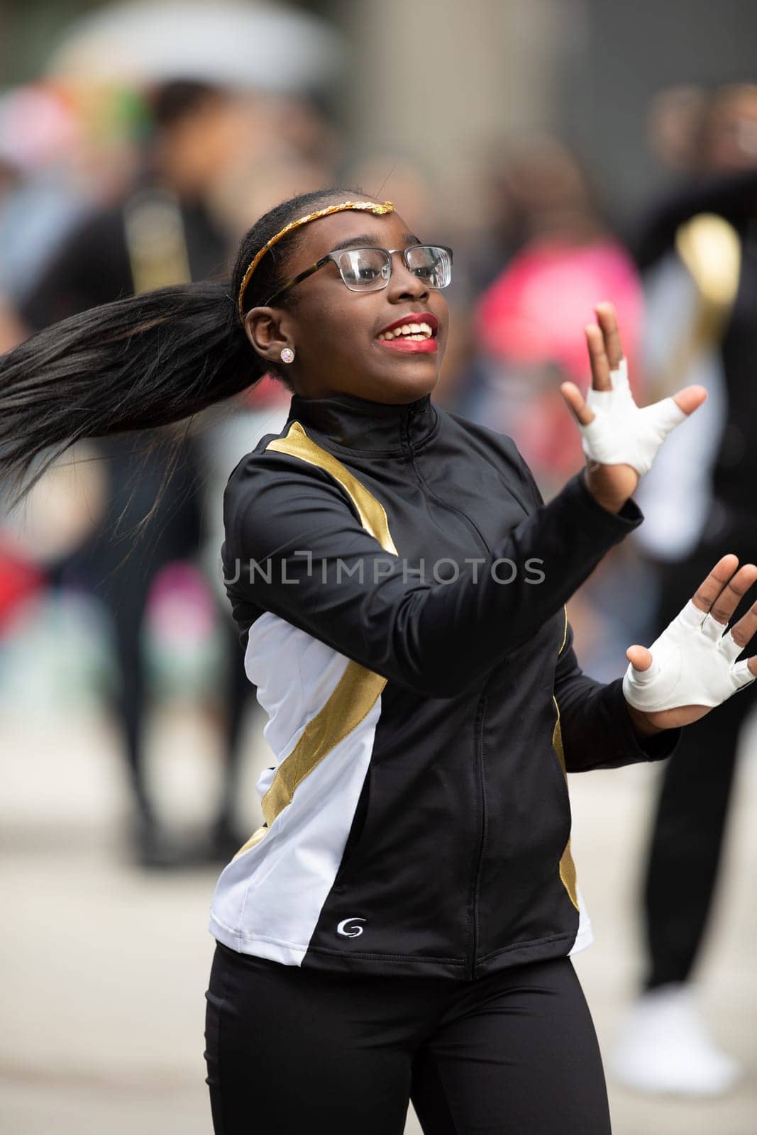 Houston, Texas, USA - November 22, 2018 The H-E-B Thanksgiving Day Parade, Texas Youth Academy Original Thunder Cheerleaders dancing at the parade