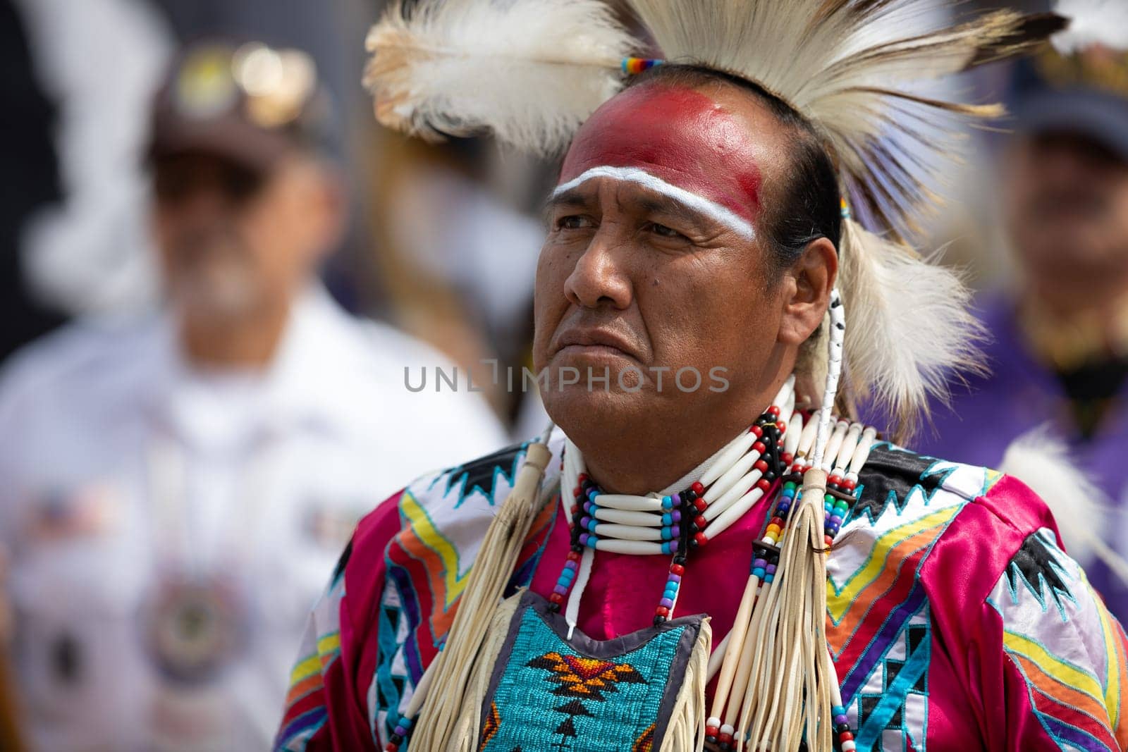 Milwaukee, Wisconsin, USA - September 8, 2018 The Indian Summer Festival Man wearing traditional native american clothing at the pow wow competition.