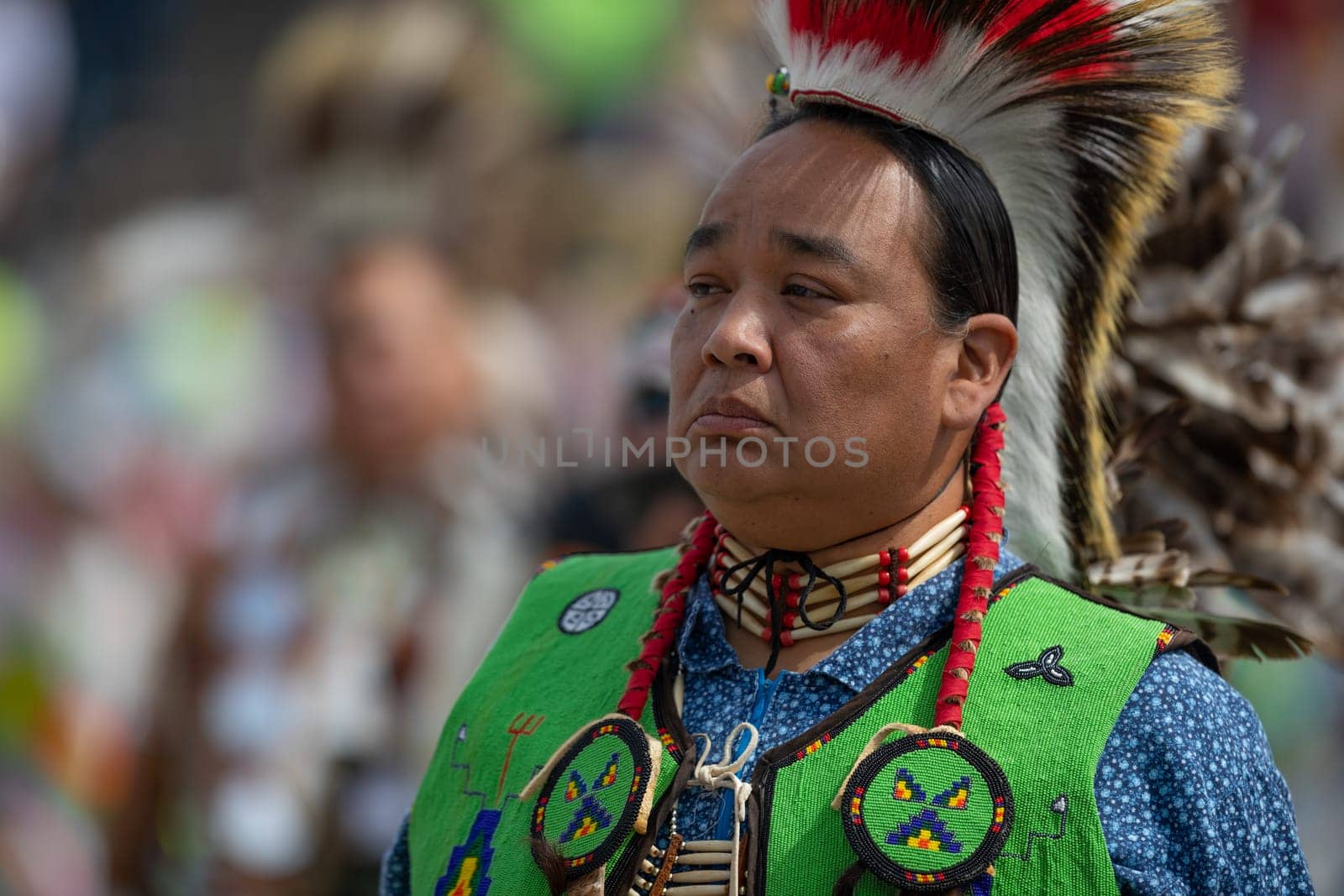 Milwaukee, Wisconsin, USA - September 8, 2018 The Indian Summer Festival Man wearing traditional native american clothing at the pow wow competition.