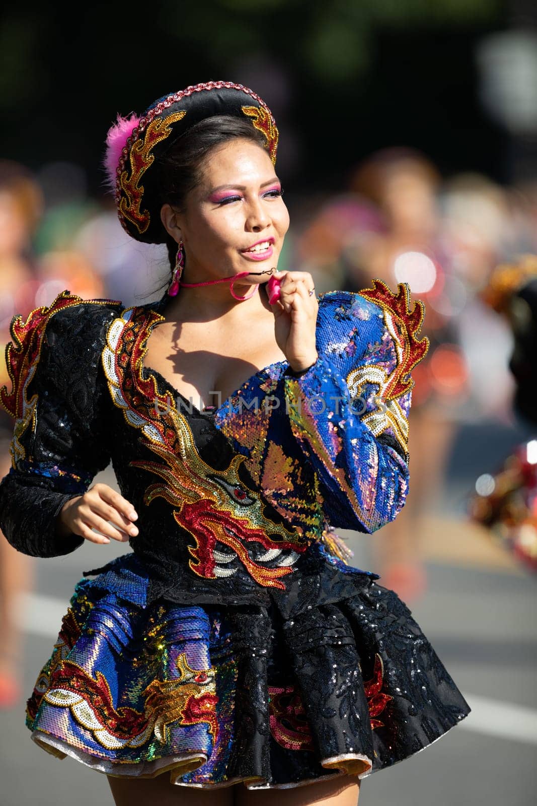 Washington, D.C., USA - September 29, 2018: The Fiesta DC Parade, Bolivian women wearing traditional clothing performing a traditional dance from bolivia