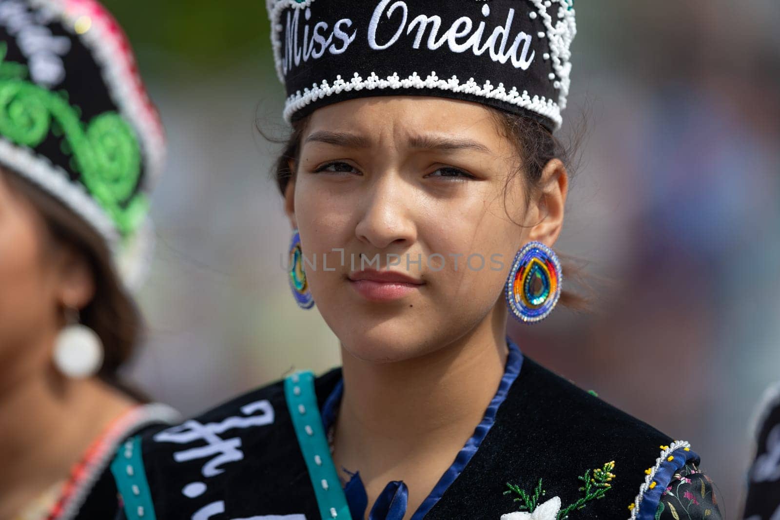 Milwaukee, Wisconsin, USA - September 8, 2018 The Indian Summer Festival Young woman wearing traditional native american clothing at the pow wow competition.