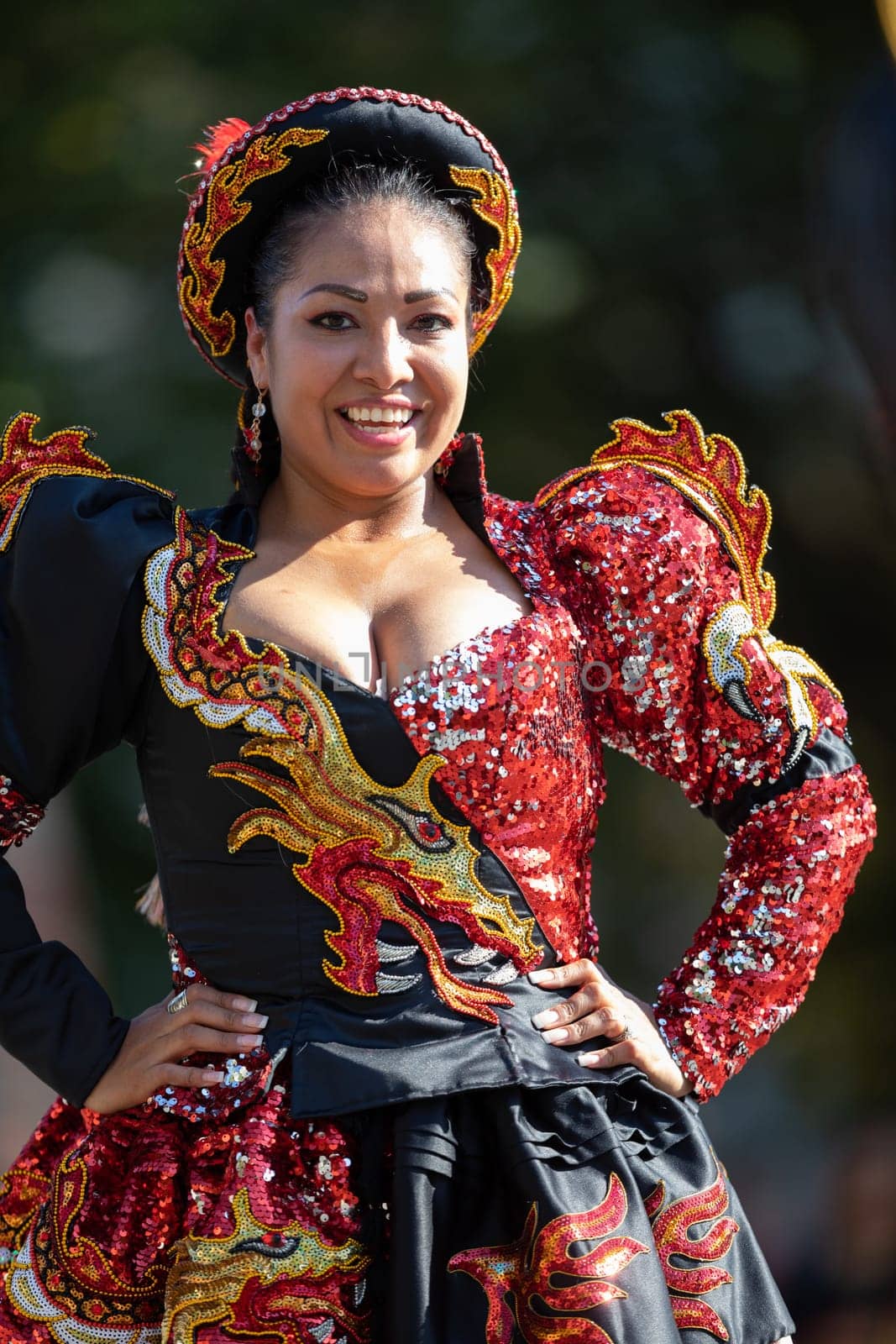 Washington, D.C., USA - September 29, 2018: The Fiesta DC Parade, Bolivian women wearing traditional clothing performing a traditional dance from bolivia