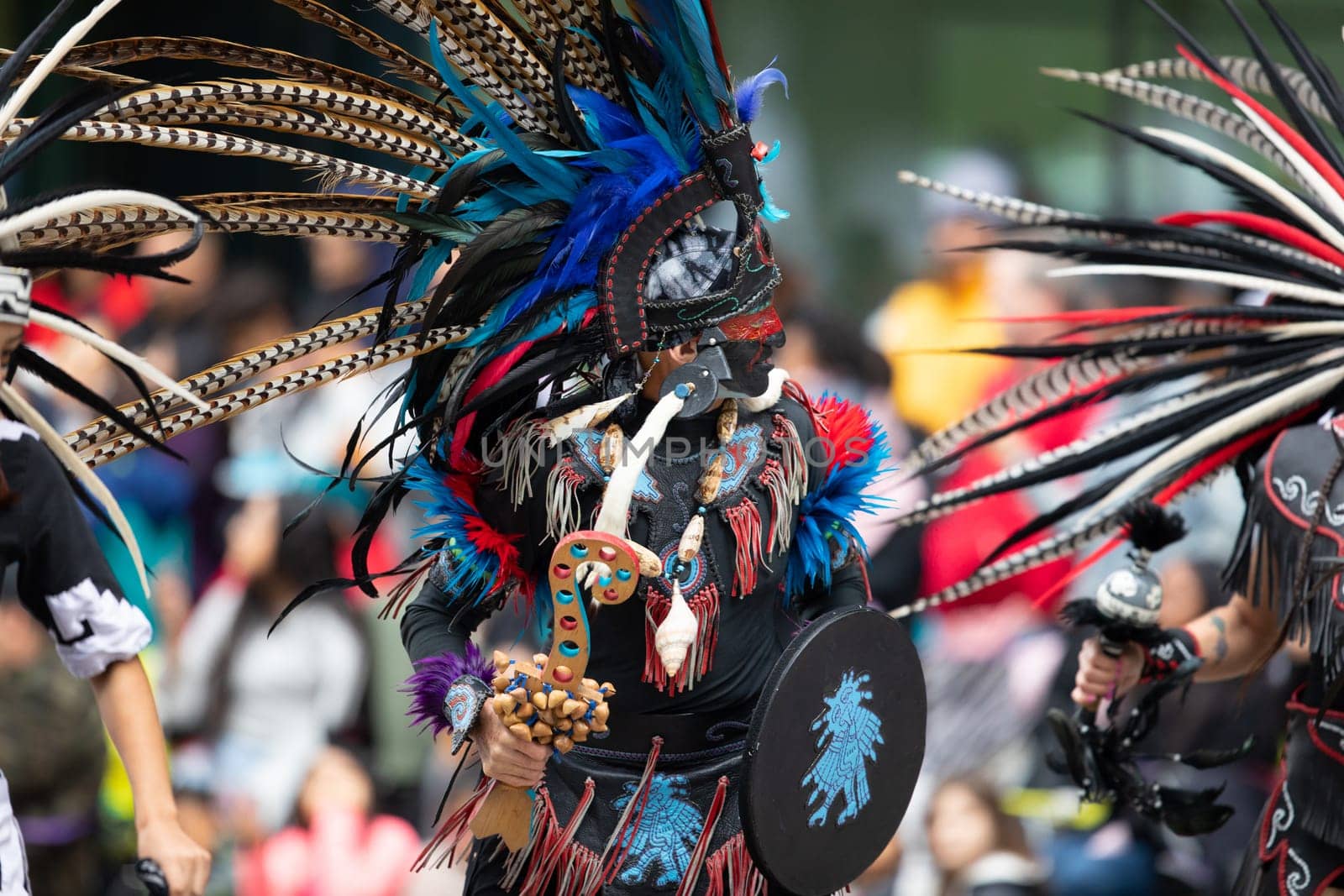 Houston, Texas, USA - November 22, 2018 The H-E-B Thanksgiving Day Parade, Men and women wearing aztec clothing dancing at the parade
