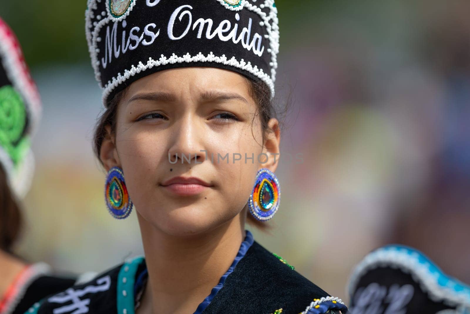Milwaukee, Wisconsin, USA - September 8, 2018 The Indian Summer Festival Young woman wearing traditional native american clothing at the pow wow competition.