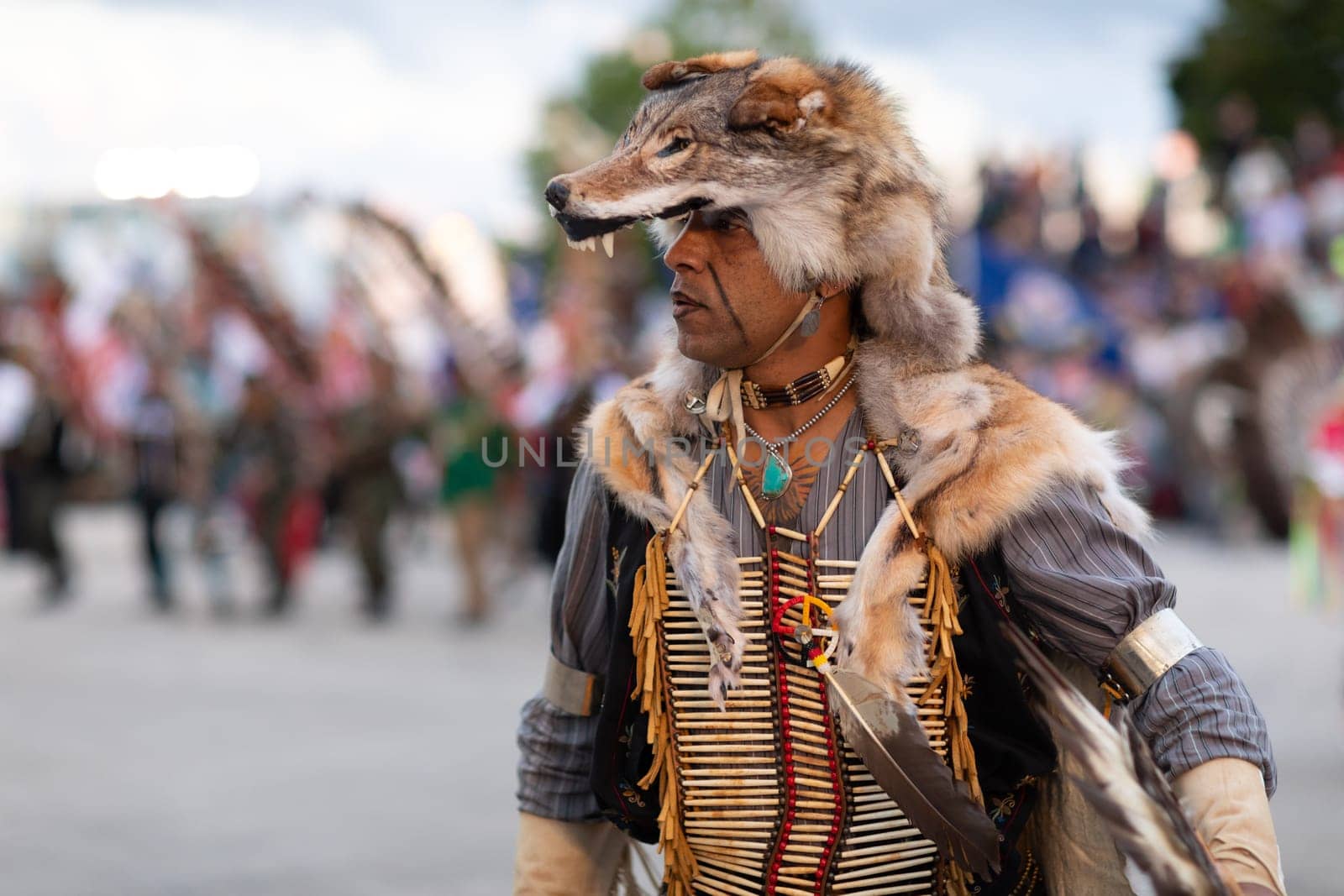 Milwaukee, Wisconsin, USA - September 8, 2018 The Indian Summer Festival Man wearing traditional native american clothing at the pow wow competition.