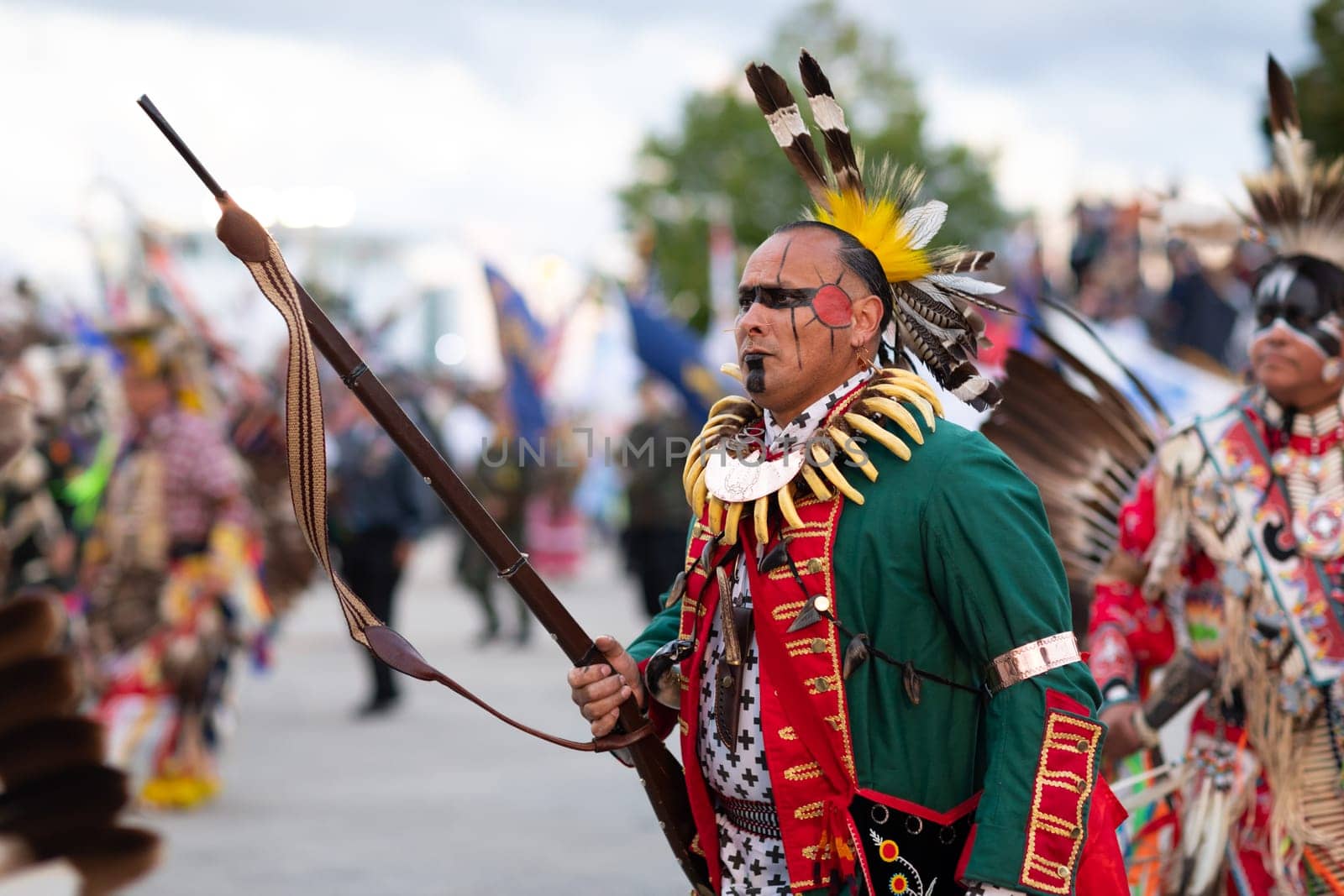 Milwaukee, Wisconsin, USA - September 8, 2018 The Indian Summer Festival Man wearing traditional native american clothing at the pow wow competition.