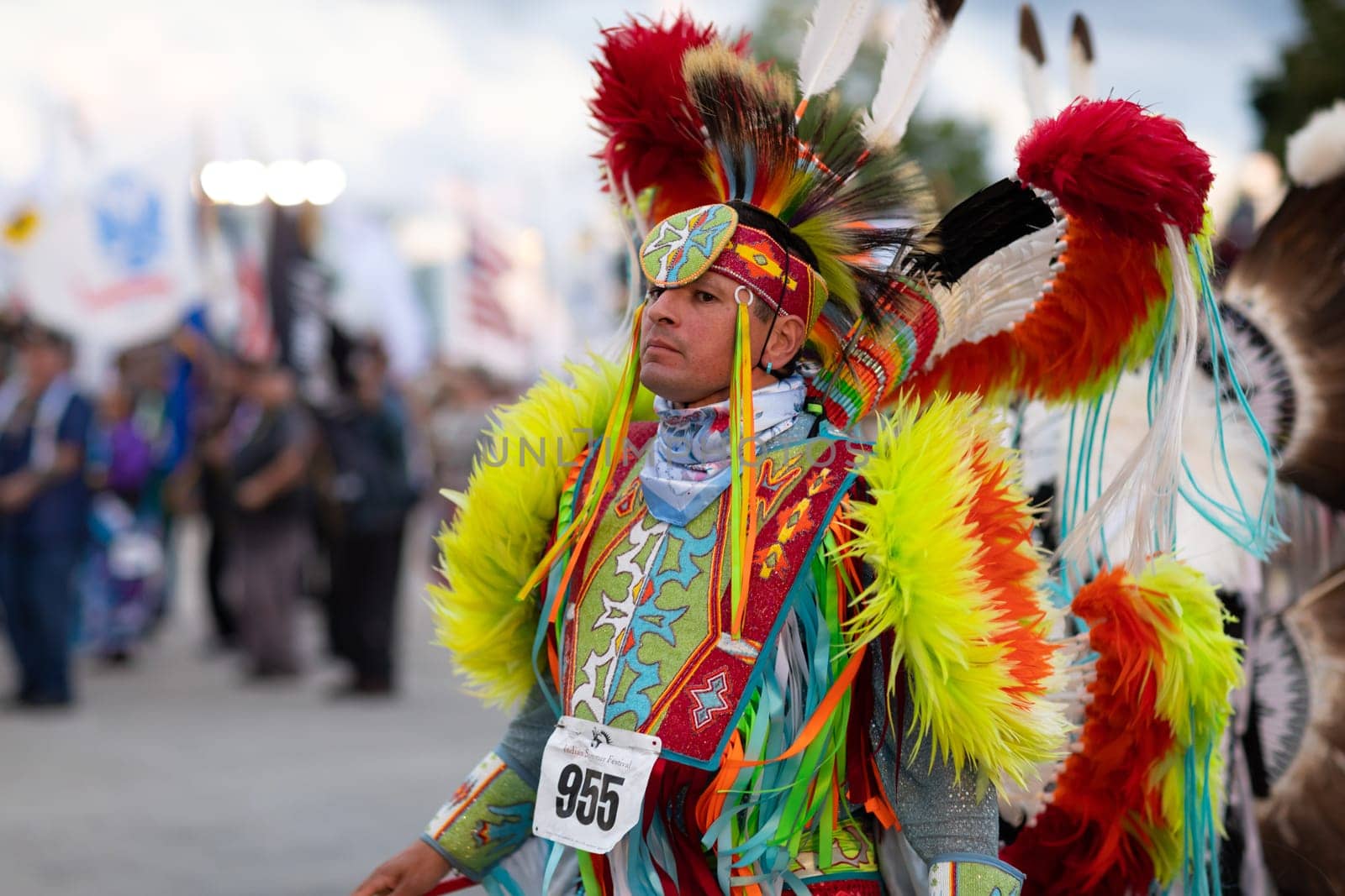 Milwaukee, Wisconsin, USA - September 8, 2018 The Indian Summer Festival Man wearing traditional native american clothing at the pow wow competition.