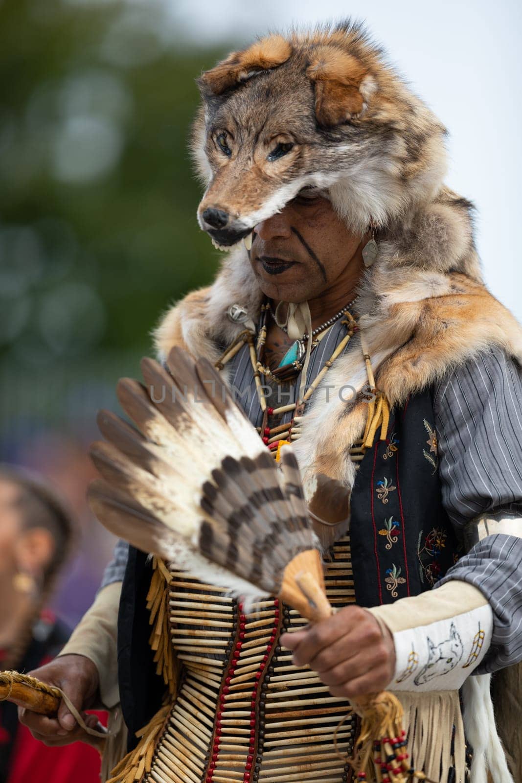Milwaukee, Wisconsin, USA - September 8, 2018 The Indian Summer Festival Man wearing traditional native american clothing at the pow wow competition.