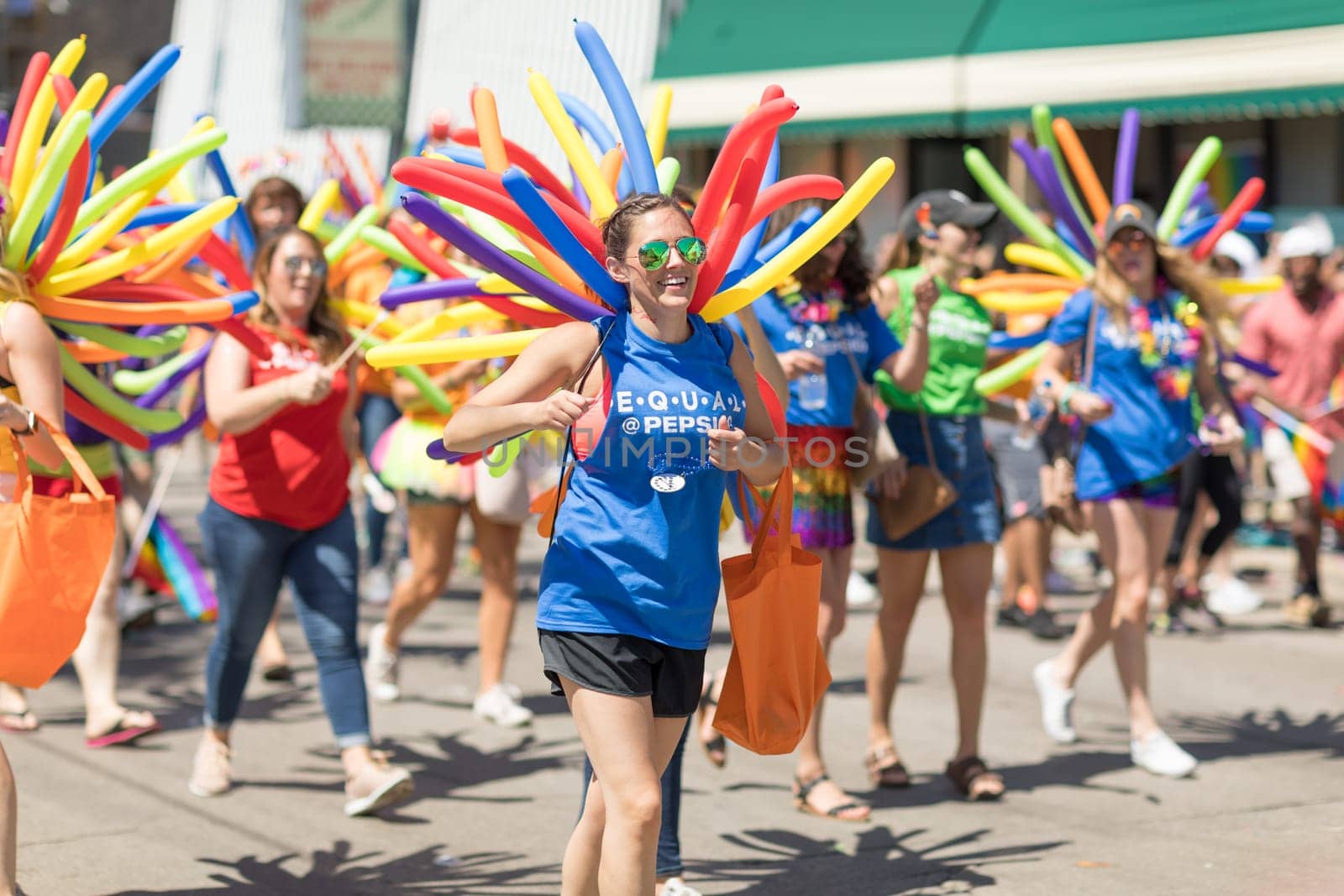 Chicago, Illinois, USA - June 24, 2018: the LGBTQ Pride Parade, People wearing colorfull outfits, celebrating on the streets of Chicago