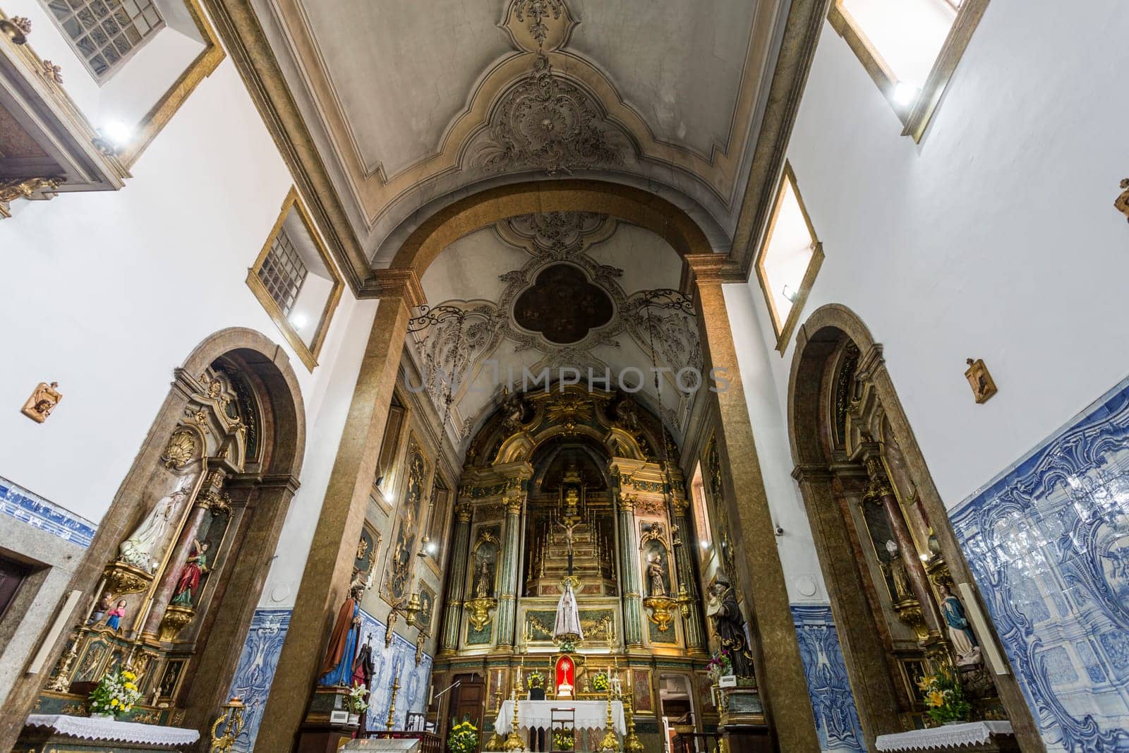 Detail of the main and two side chapels of the small Church of the Flamengas at the Convent of Our Lady of Quietude, in Alcantara, Lisbon, Portugal