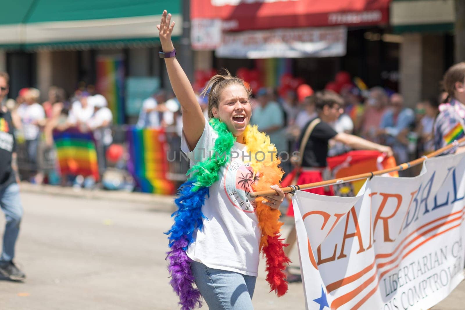 Chicago, Illinois, USA - June 24, 2018  woman supporting the libertarian party during the LGBTQ Pride Parade in Chicago