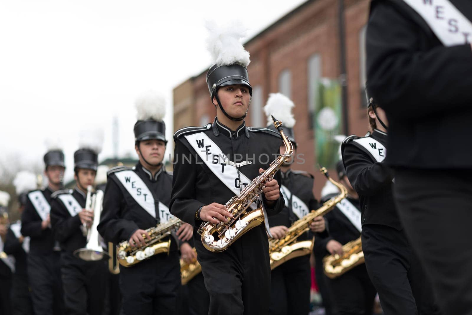 Holland, Michigan, USA - May 12, 2018 Members of the West Ottawa High School Marching Band, Holland MI, perform at the Muziek Parade, during the Tulip Time Festival