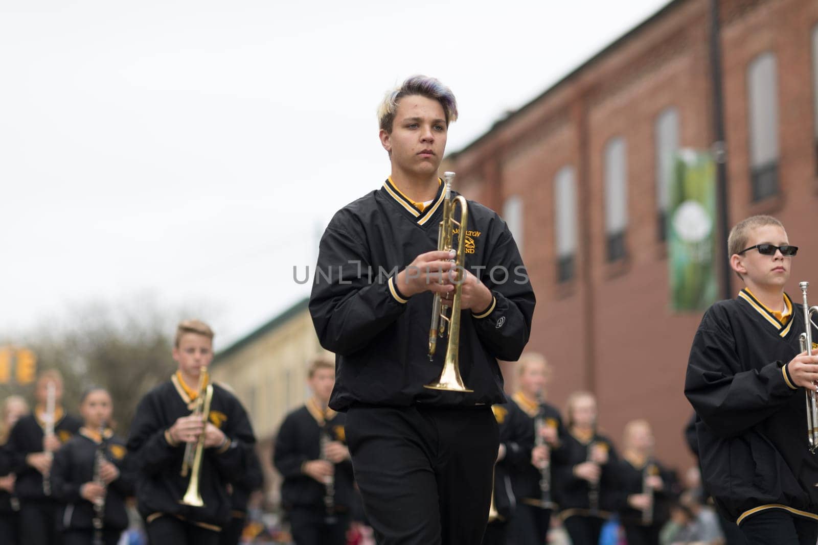 Holland, Michigan, USA - May 12, 2018 Members of the Hamilton Middle School marching band perform at the Muziek Parade, during the Tulip Time Festival