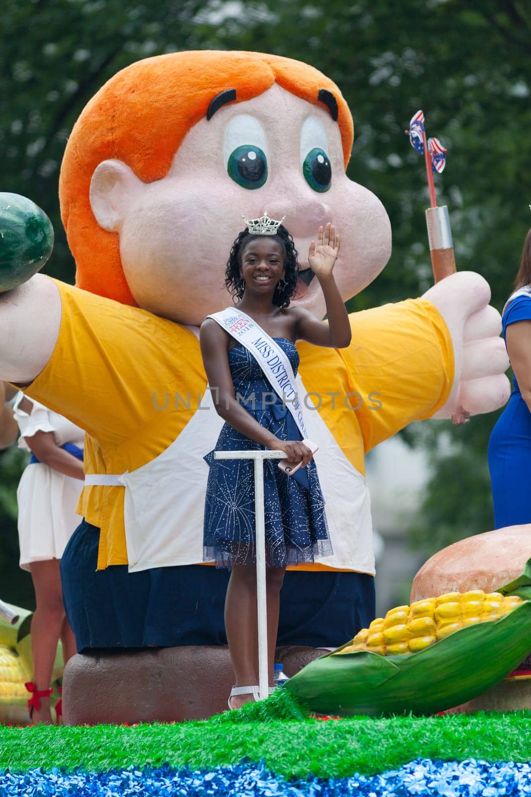 Washington, D.C., USA - July 4, 2018, The National Independence Day Parade, group of beauty queens on a float going down constitution avenue