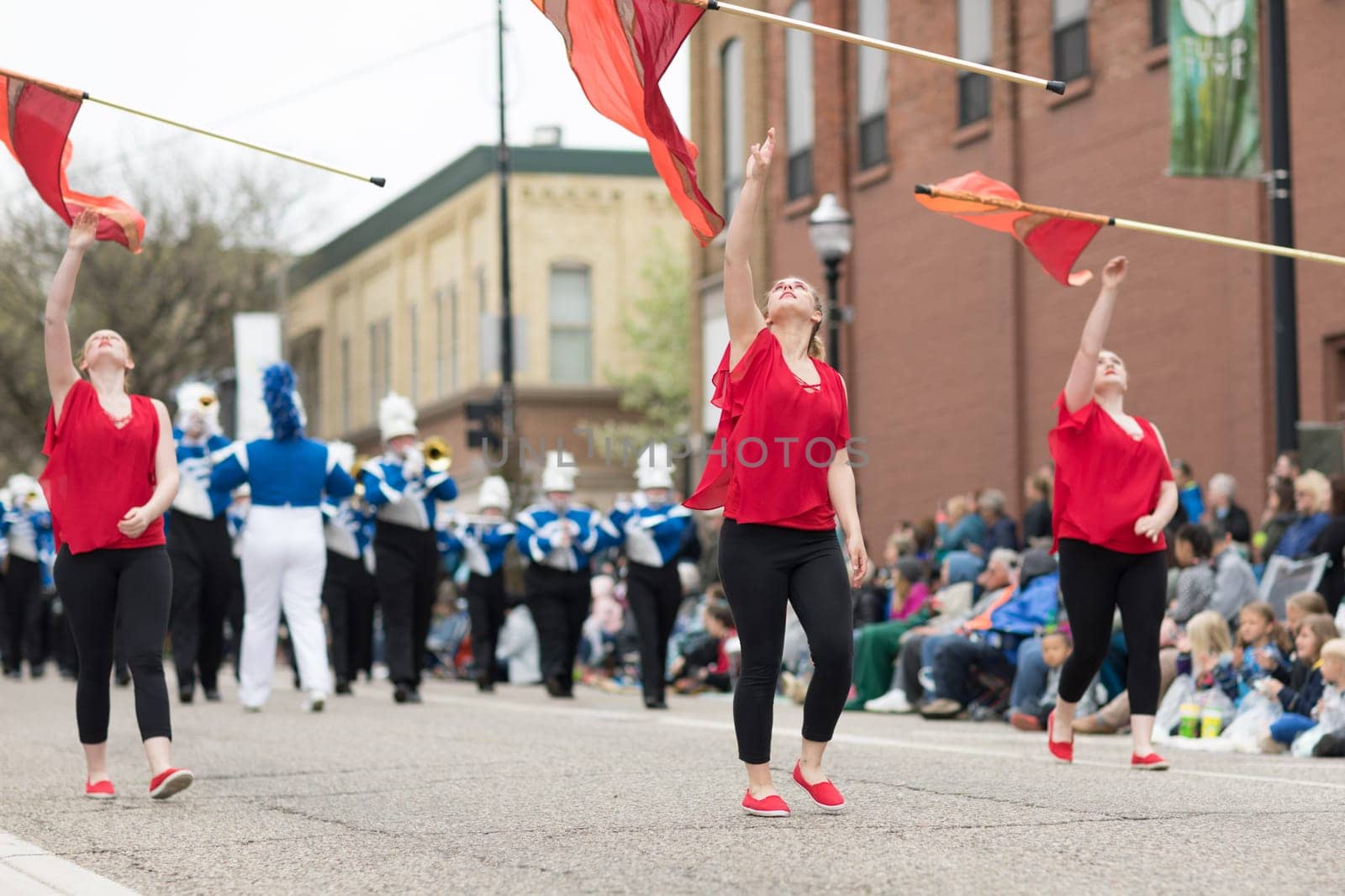 Holland, Michigan, USA - May 12, 2018 Members of the merrill high school marching jays perform at the Muziek Parade, during the Tulip Time Festival