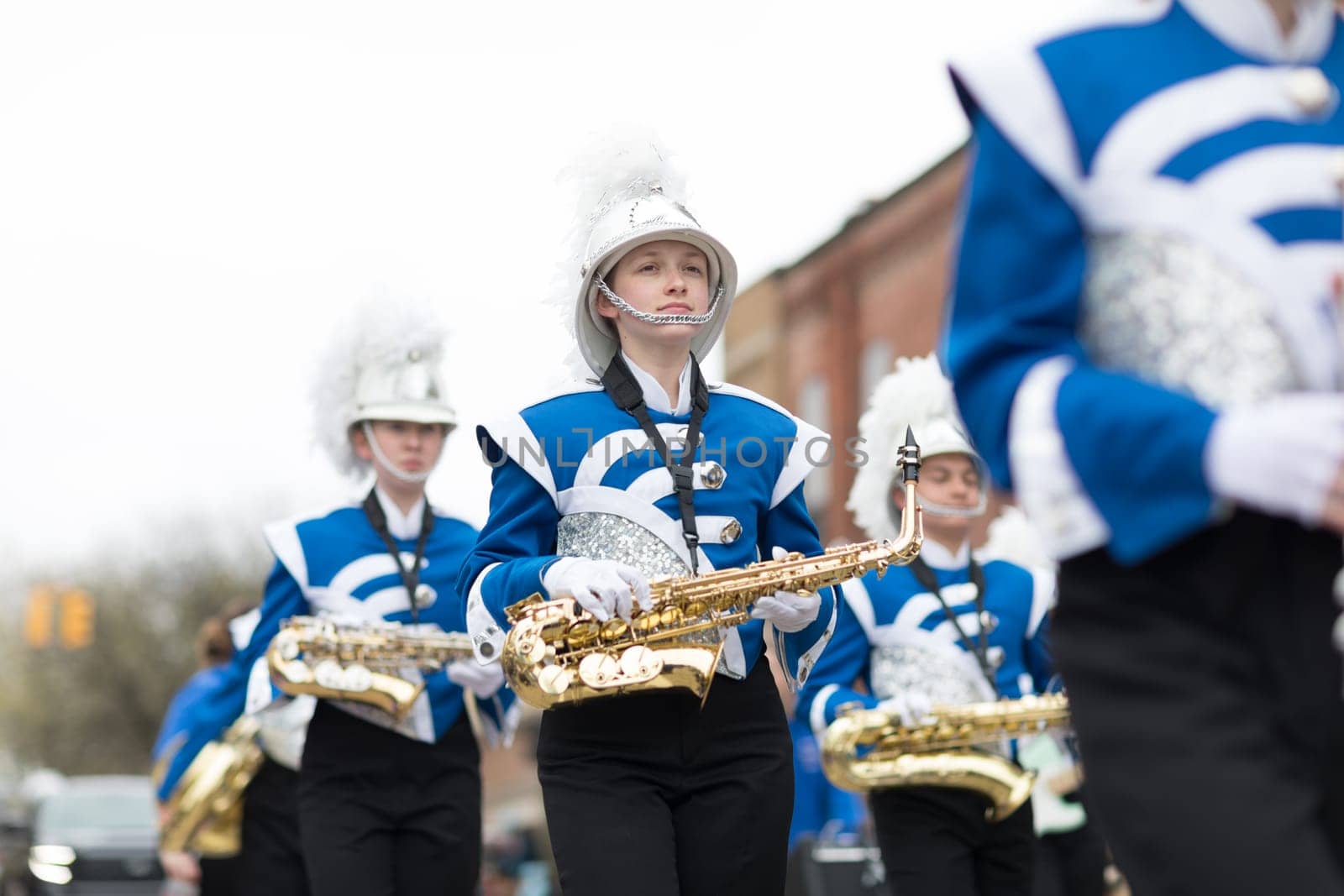 Holland, Michigan, USA - May 12, 2018 Members of the merrill high school marching jays perform at the Muziek Parade, during the Tulip Time Festival