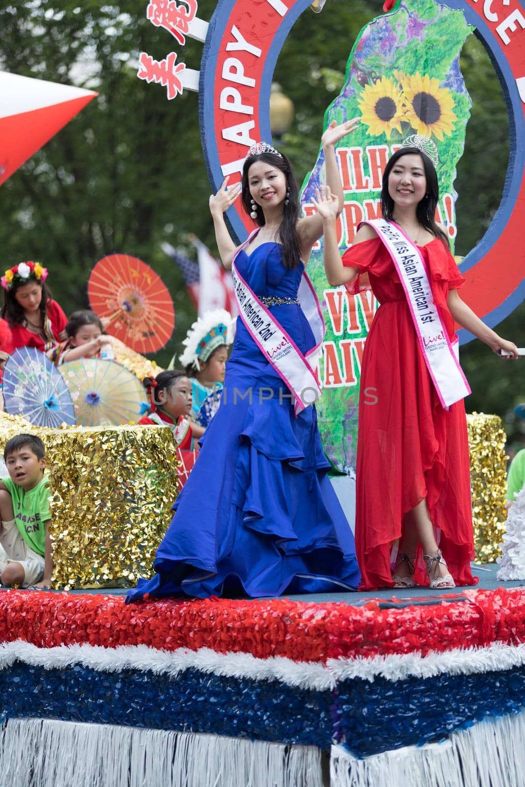 Washington, D.C., USA - July 4, 2018, The National Independence Day Parade, Taiwanese beauty queens on a float, going down constitution avenue during the parade