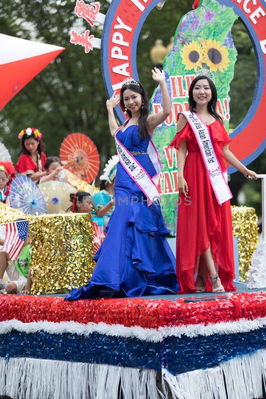 Washington, D.C., USA - July 4, 2018, The National Independence Day Parade, Taiwanese beauty queens on a float, going down constitution avenue during the parade