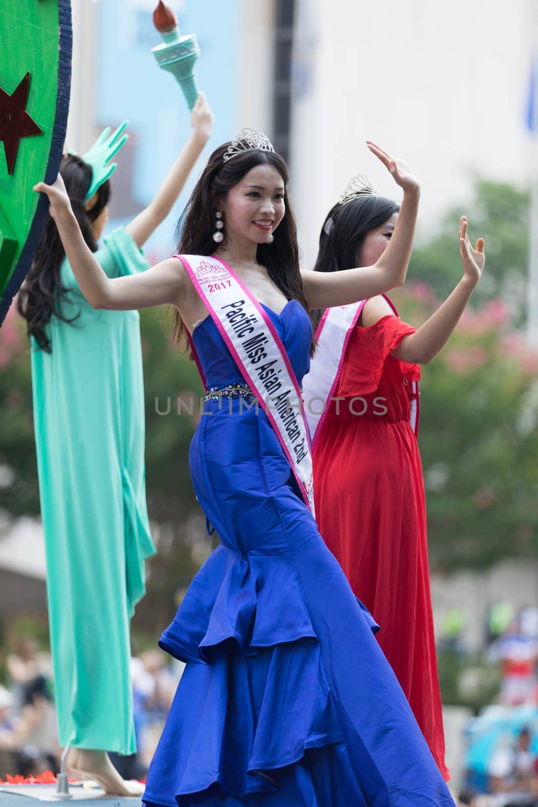 Washington, D.C., USA - July 4, 2018, The National Independence Day Parade, Taiwanese beauty queens on a float, going down constitution avenue during the parade