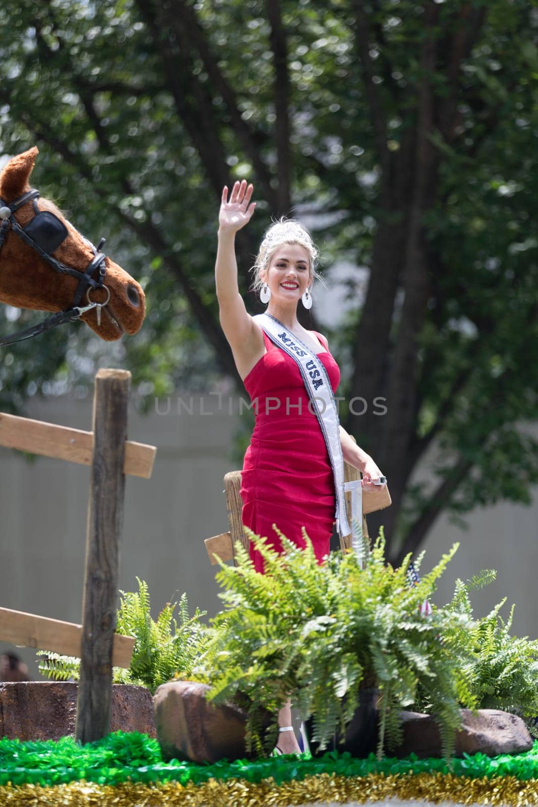 Washington, D.C., USA - July 4, 2018, The National Independence Day Parade, Miss USA on a float, going down constitution avenue, during the parade