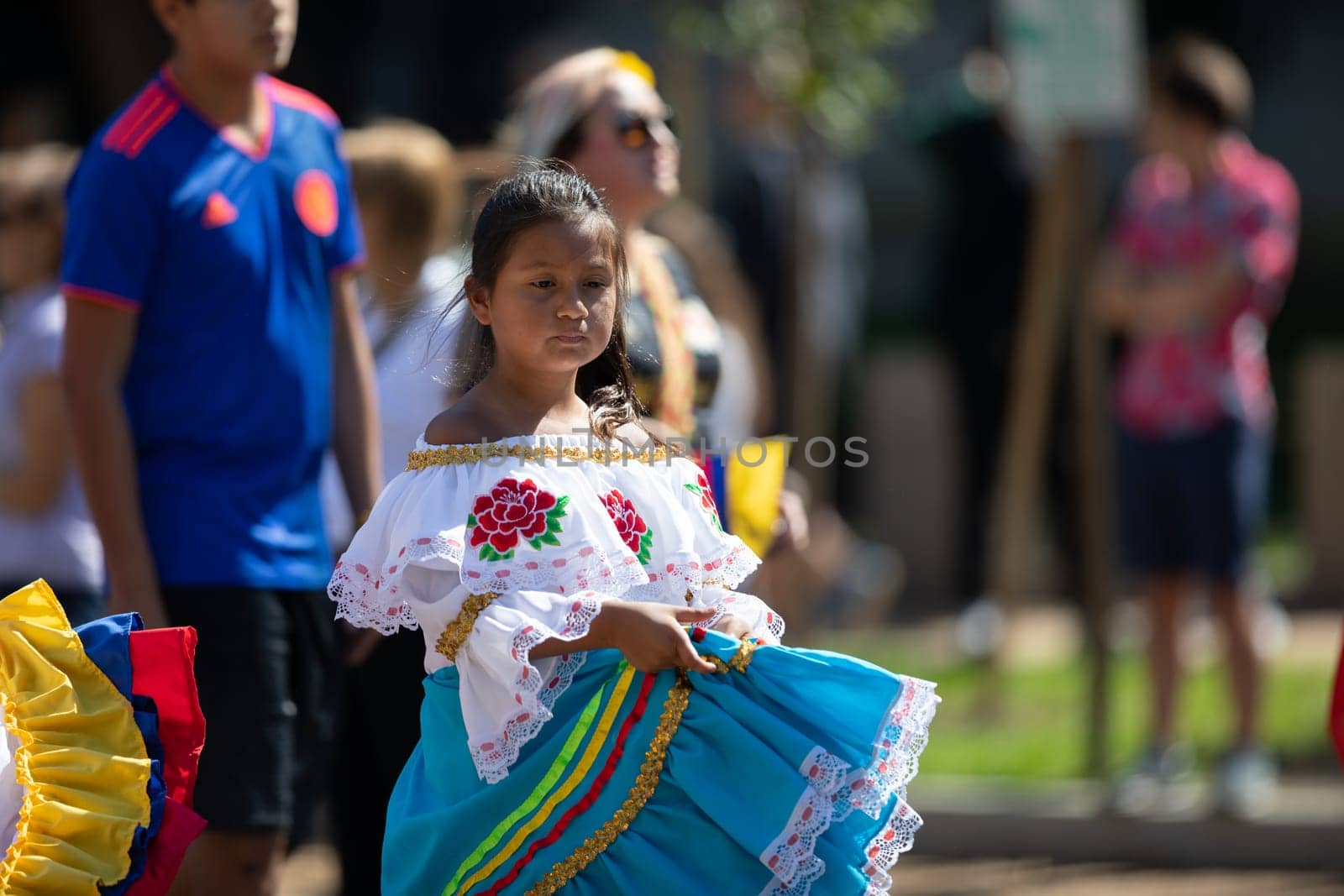 Washington, D.C., USA - September 29, 2018: The Fiesta DC Parade, Colombian girl wearing traditional clothing dancing