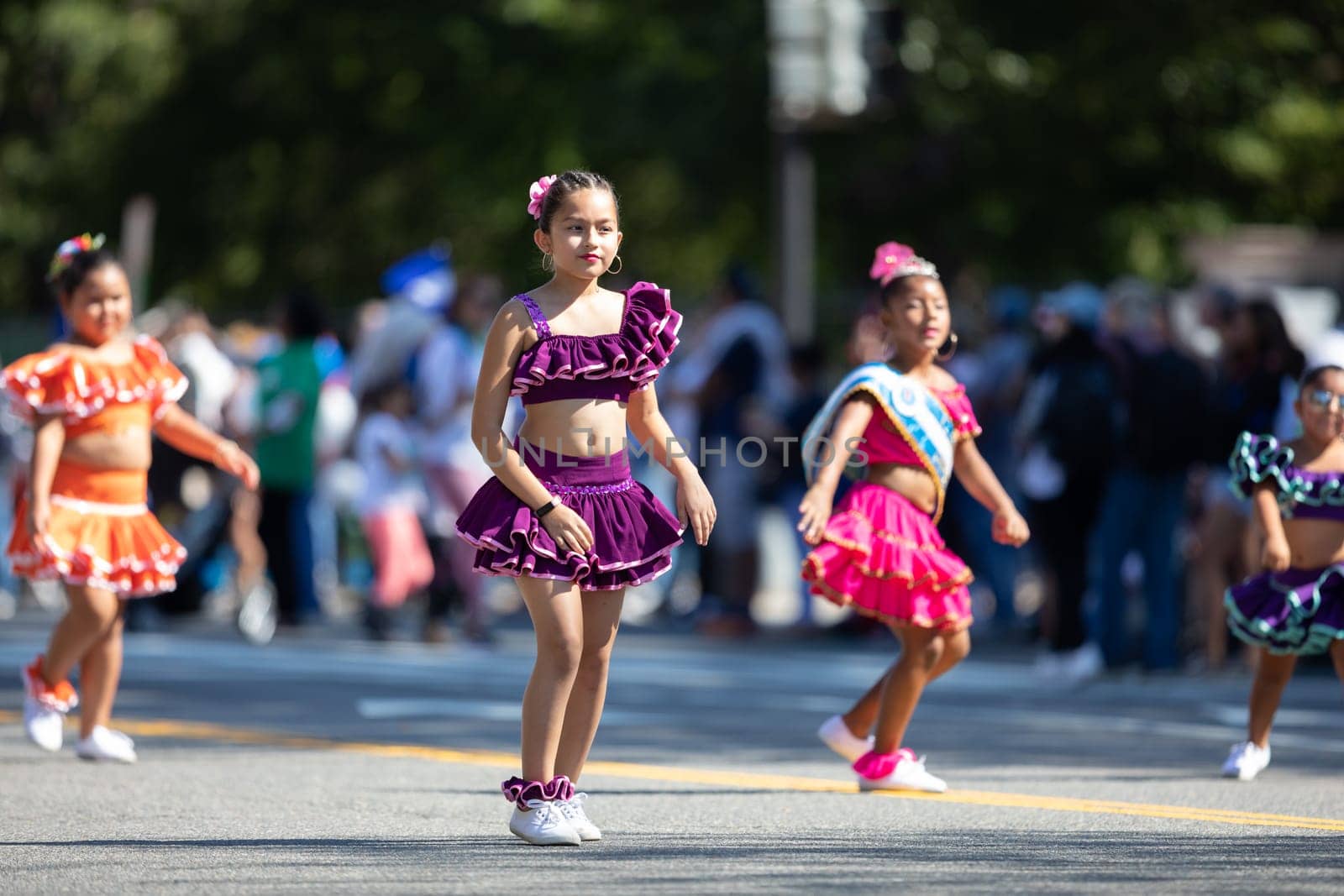 Washington, D.C., USA - September 29, 2018: The Fiesta DC Parade, peruvian girl wearing traditional clothing danicng during the parade