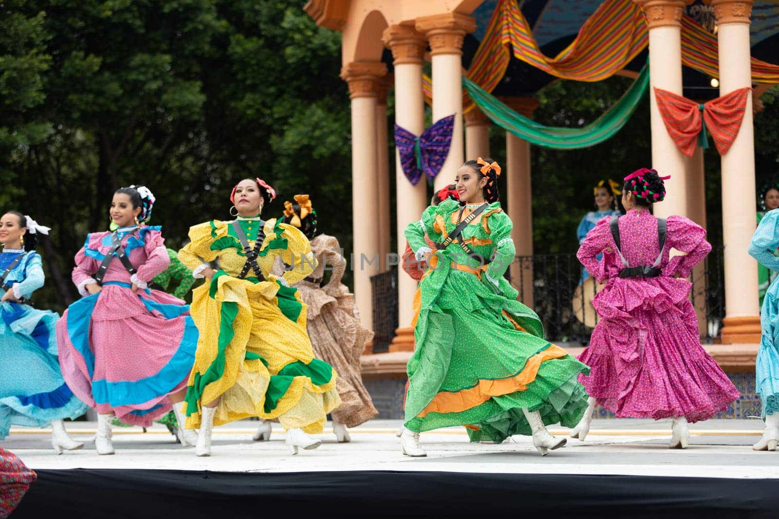 Matamoros, Tamaulipas, Mexico - November 20, 2018: The November 20 Festival, Young men and women wearing traditional mexican clothing, perform traditional mexican dances at the Plaza Miguel Hidalgo.