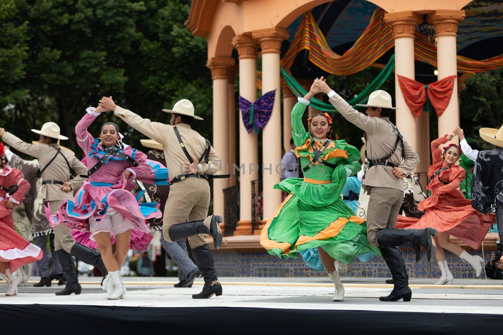 Matamoros, Tamaulipas, Mexico - November 20, 2018: The November 20 Festival, Young men and women wearing traditional mexican clothing, perform traditional mexican dances at the Plaza Miguel Hidalgo.