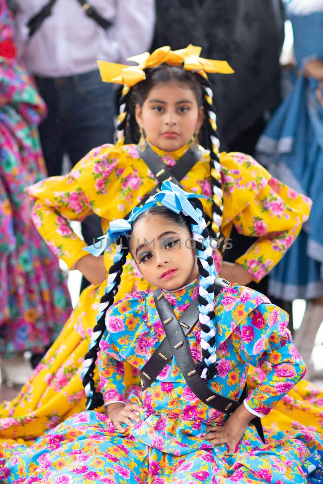 Matamoros, Tamaulipas, Mexico - November 20, 2018: The November 20 Festival, Young men and women wearing traditional mexican clothing, pose for the camera at the Plaza Miguel Hidalgo.