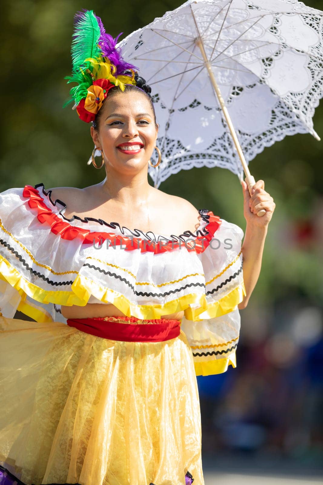 Washington, D.C., USA - September 29, 2018: The Fiesta DC Parade, Mexican woman wearing traditional clothing dancing