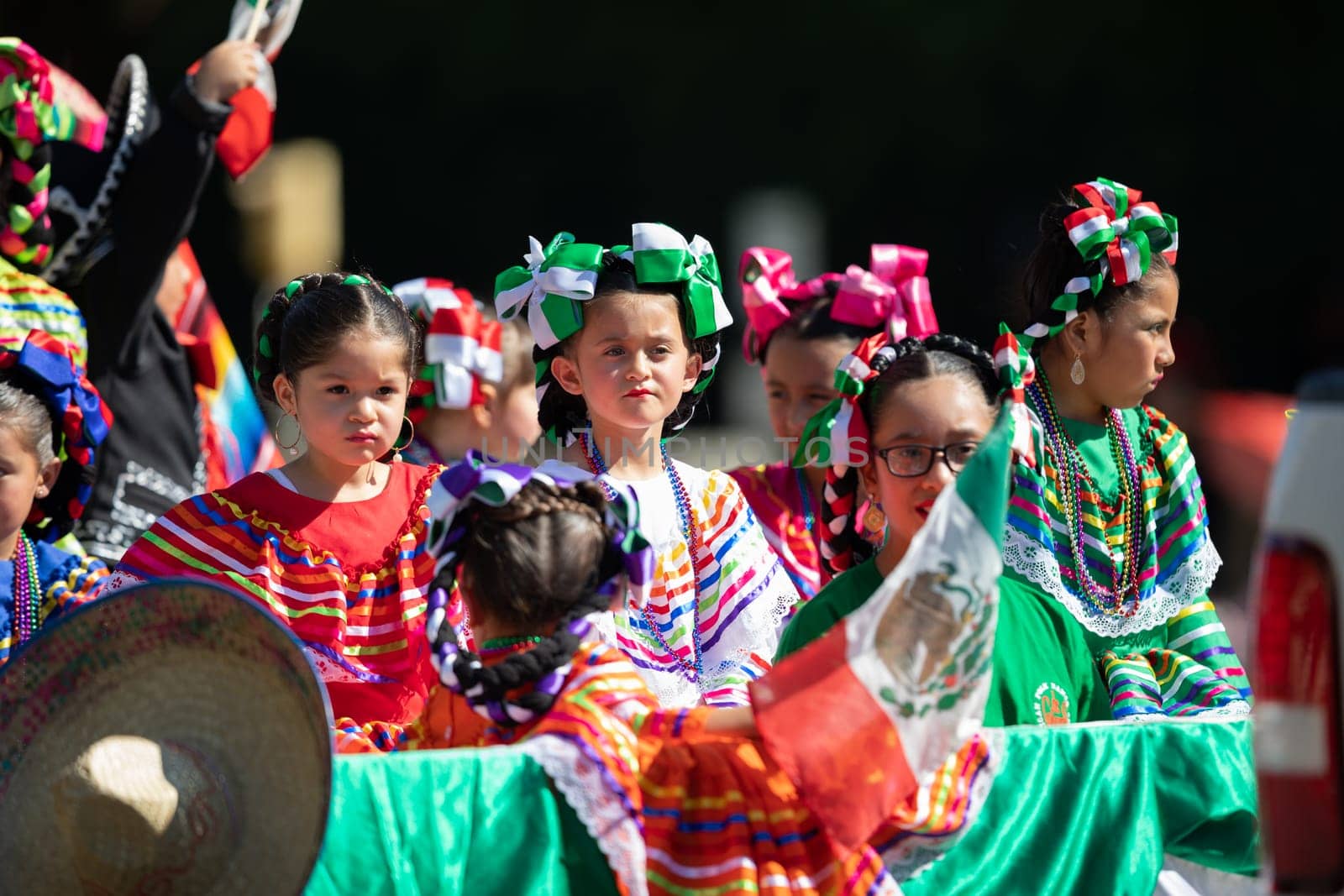Washington, D.C., USA - September 29, 2018: The Fiesta DC Parade, Mexican children on top of a float wearing traditional mexican clothing