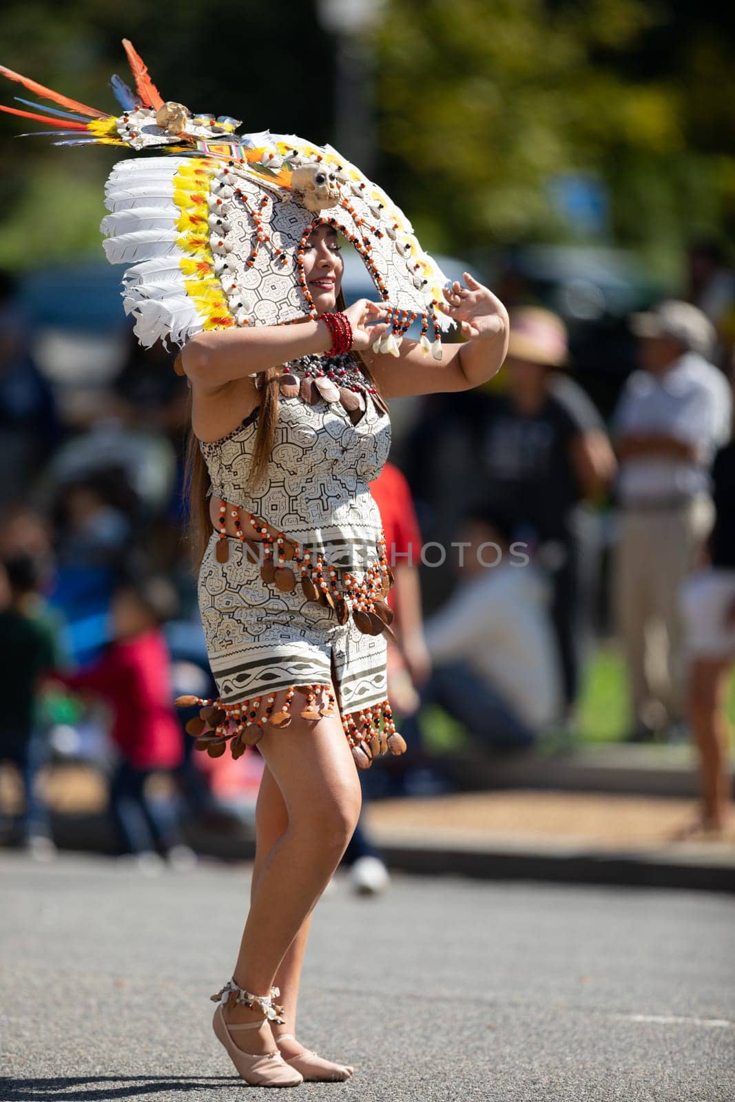 Washington, D.C., USA - September 29, 2018: The Fiesta DC Parade, peruvian woman wearing traditional clothing danicng during the parade