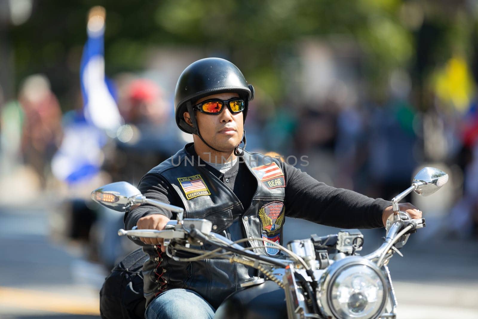 Washington, D.C., USA - September 29, 2018: The Fiesta DC Parade, Man from el Puerto Rico riding a motorcycle Members of the latin american motorcycle association