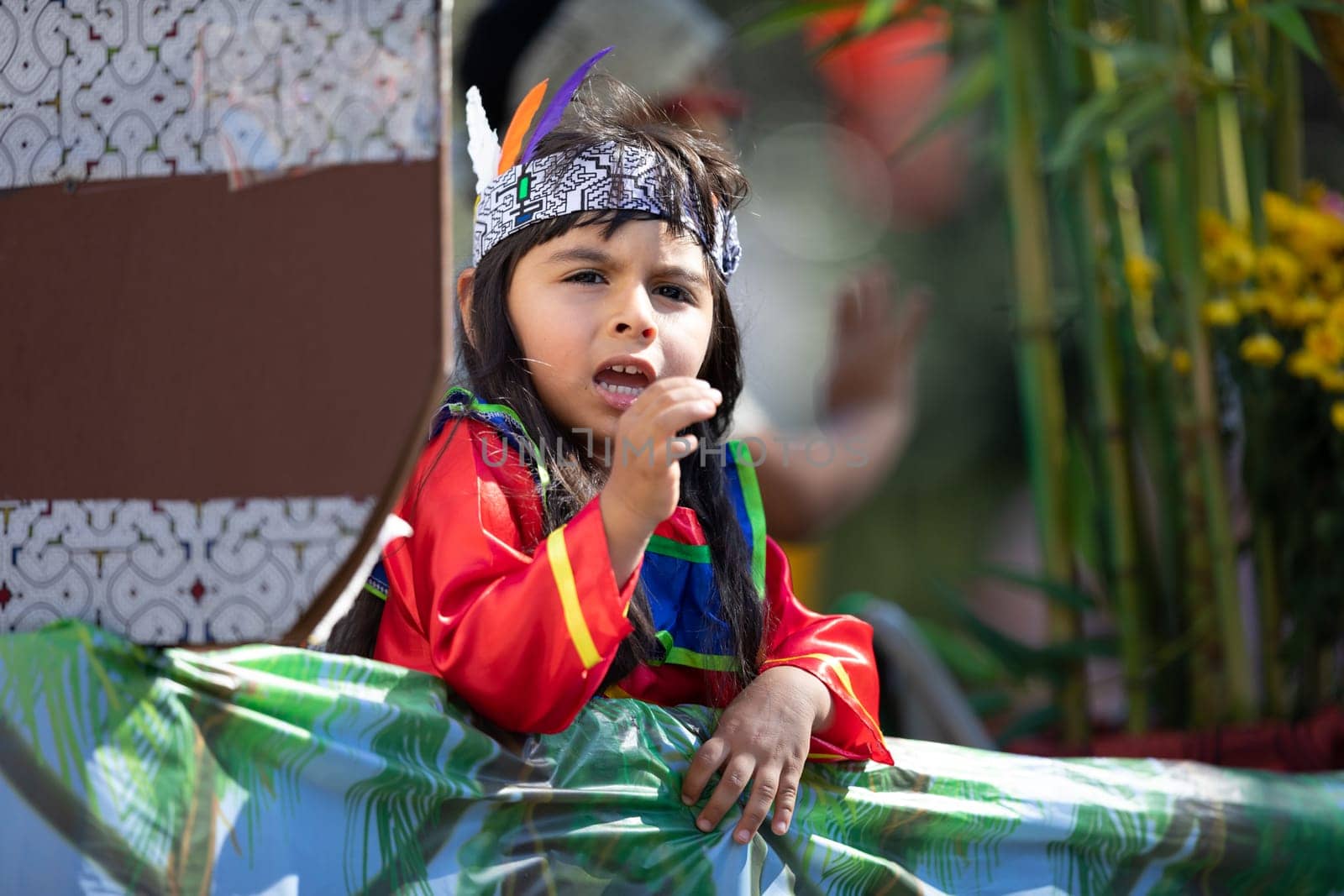 Washington, D.C., USA - September 29, 2018: The Fiesta DC Parade, Child wearing traditional peruvian clothing on a float