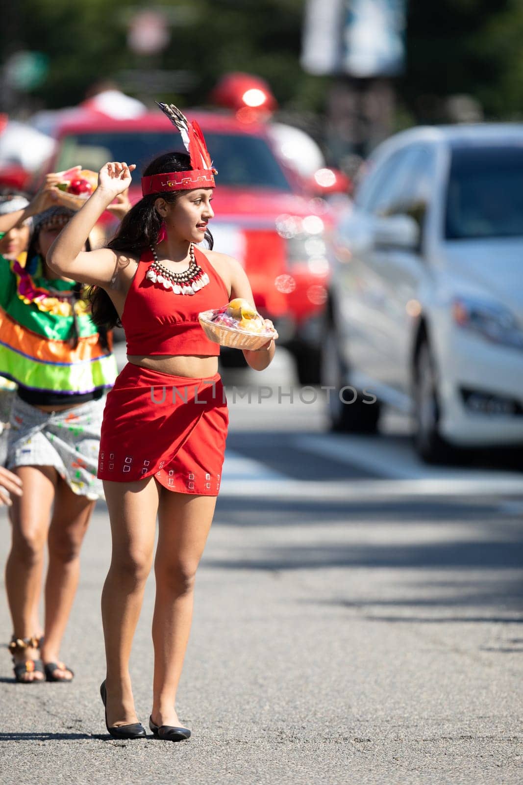 Washington, D.C., USA - September 29, 2018: The Fiesta DC Parade, peruvian woman wearing traditional clothing danicng during the parade