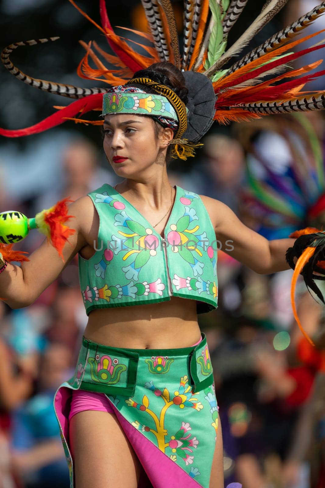Milwaukee, Wisconsin, USA - September 8, 2018 The Indian Summer Festival: Men women and children members of the Dance Academy of Mexico performing Aztec Dance