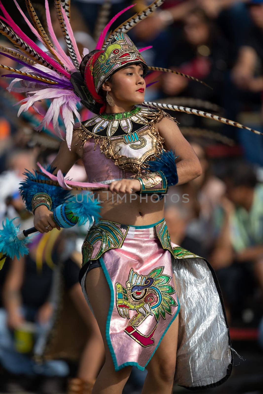 Milwaukee, Wisconsin, USA - September 8, 2018 The Indian Summer Festival: Men women and children members of the Dance Academy of Mexico performing Aztec Dance