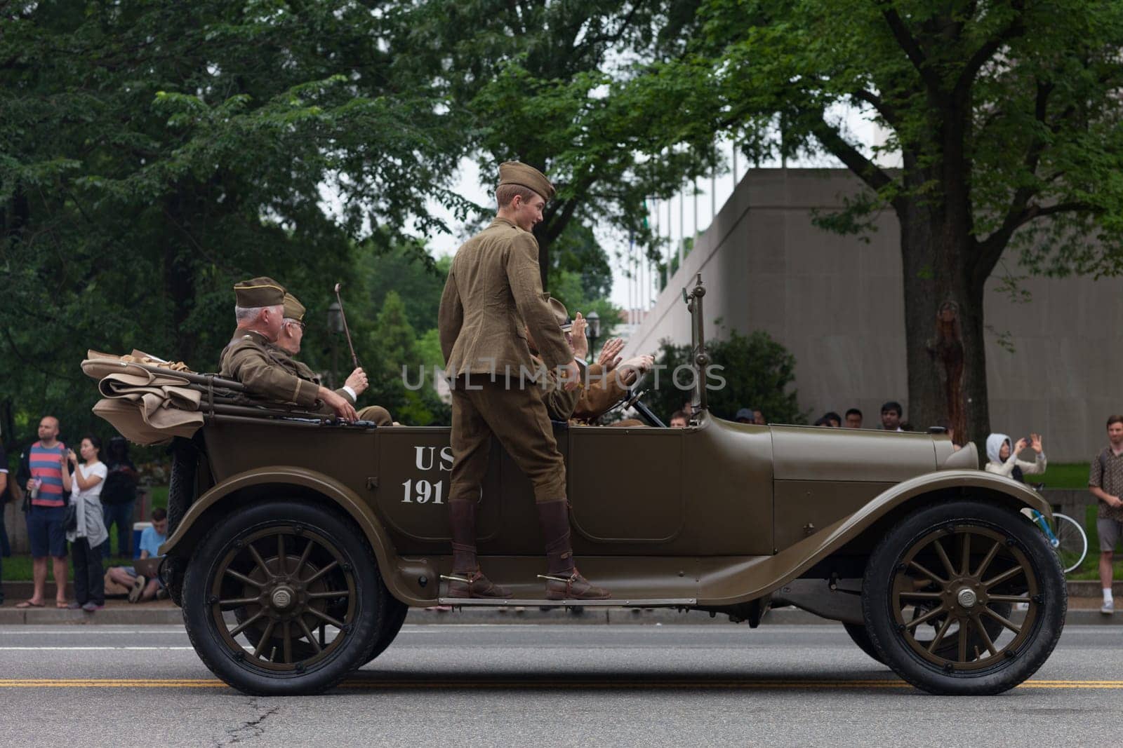 Washington, D.C., USA - May 28, 2018: The National Memorial Day Parade, Men dress up in world war one service men uniforms, going down constitution avenue