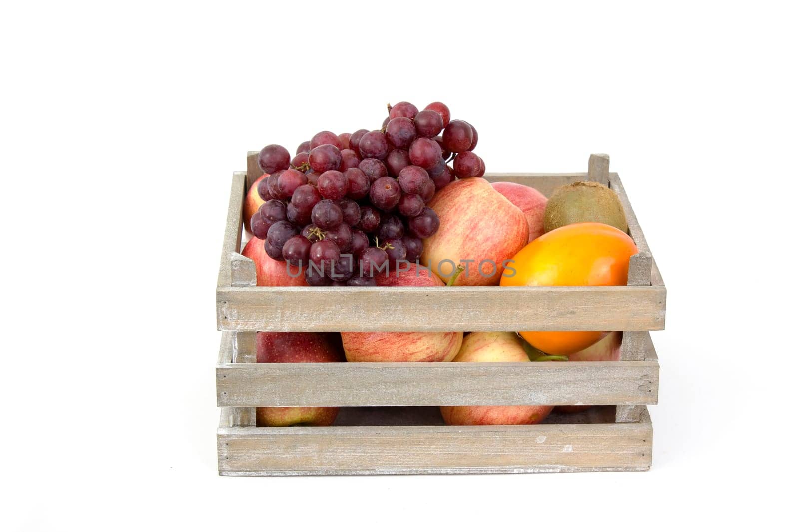 fresh fruits in a box on white background
