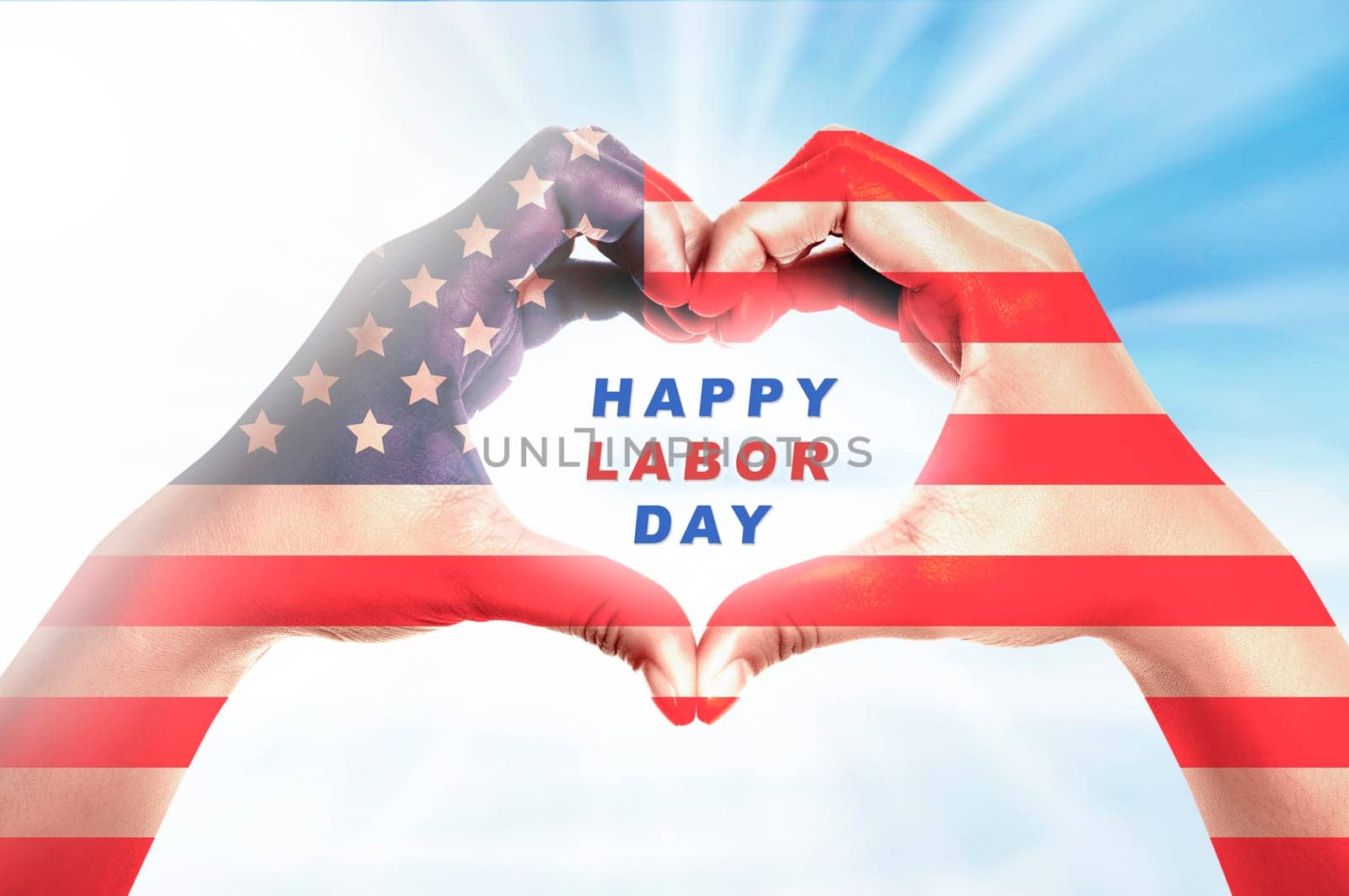 Human hands in heart shape with american flag skin and Happy labor day message over bright background. Labor day concept