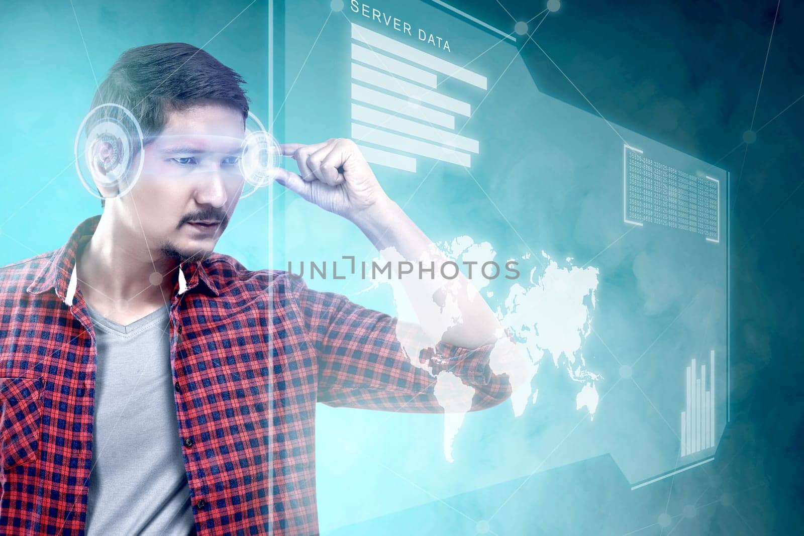 Asian man looking at digital interface with virtual glasses device display the world map, graphic bar and binary code. Augmented reality technology