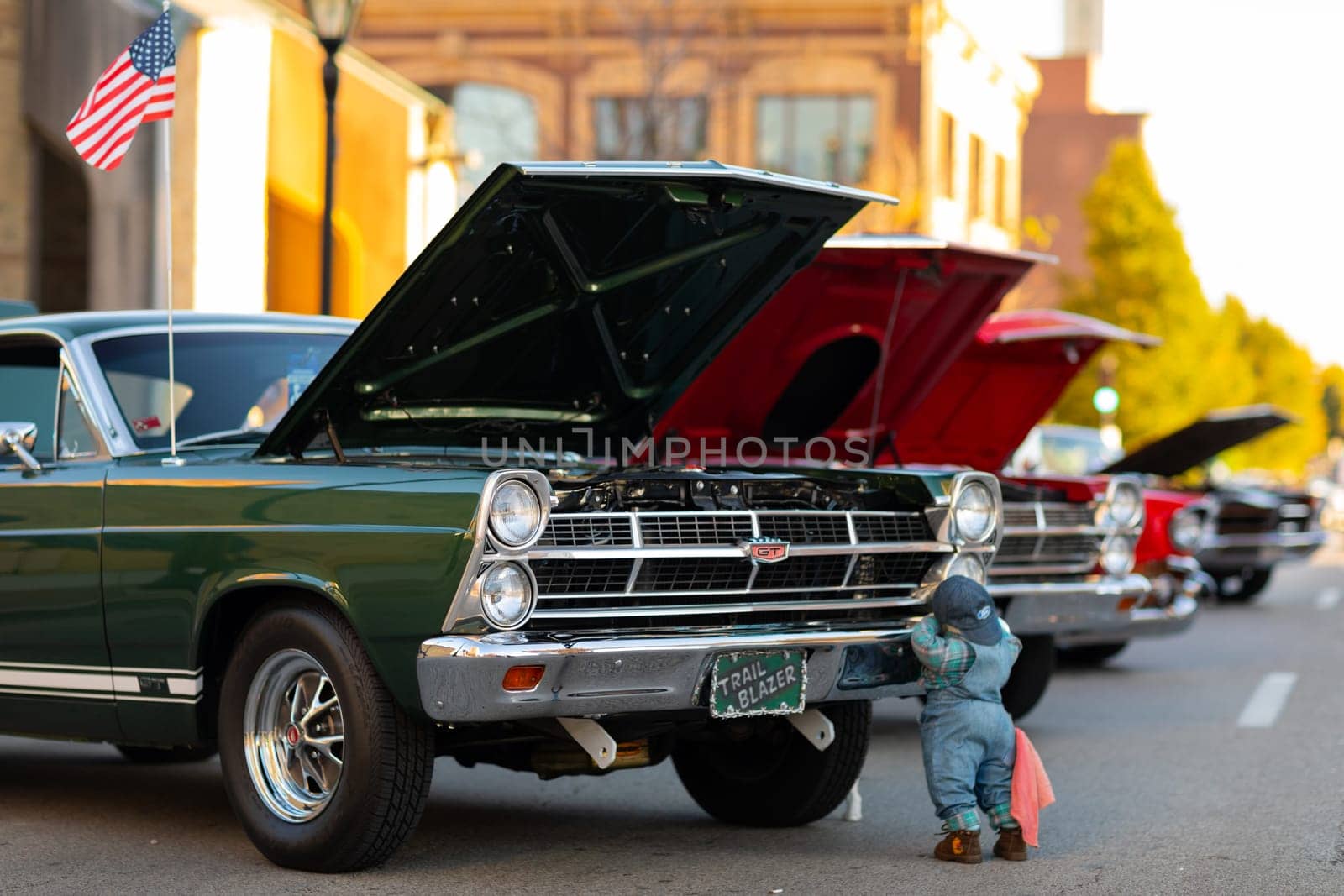 Springfield, Illinois, USA - September 22, 2018: The Route 66 Mother Road Festival, Ford Fairlane GT with a pair of dolls on the streets of downtown Springfield