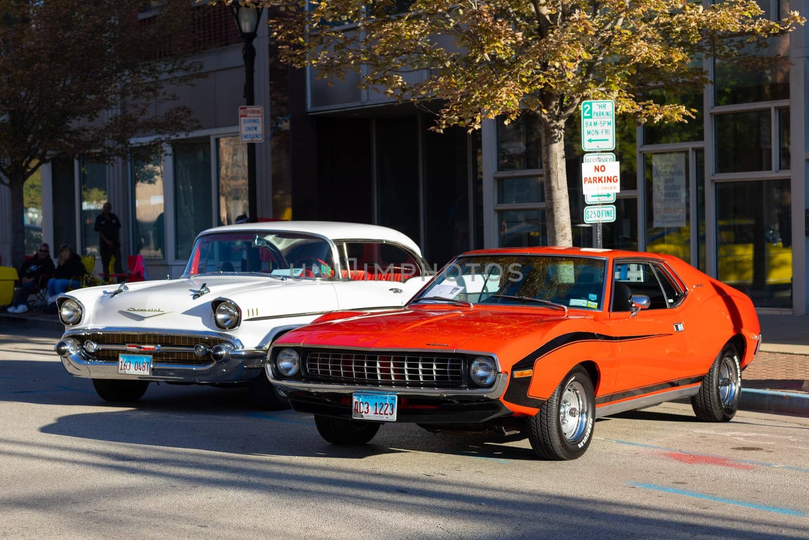Springfield, Illinois, USA - September 22, 2018: The Route 66 Mother Road Festival, AMC Javelin SST, next to a Chevrolet Bel Air, on the streets of downtown Springfield
