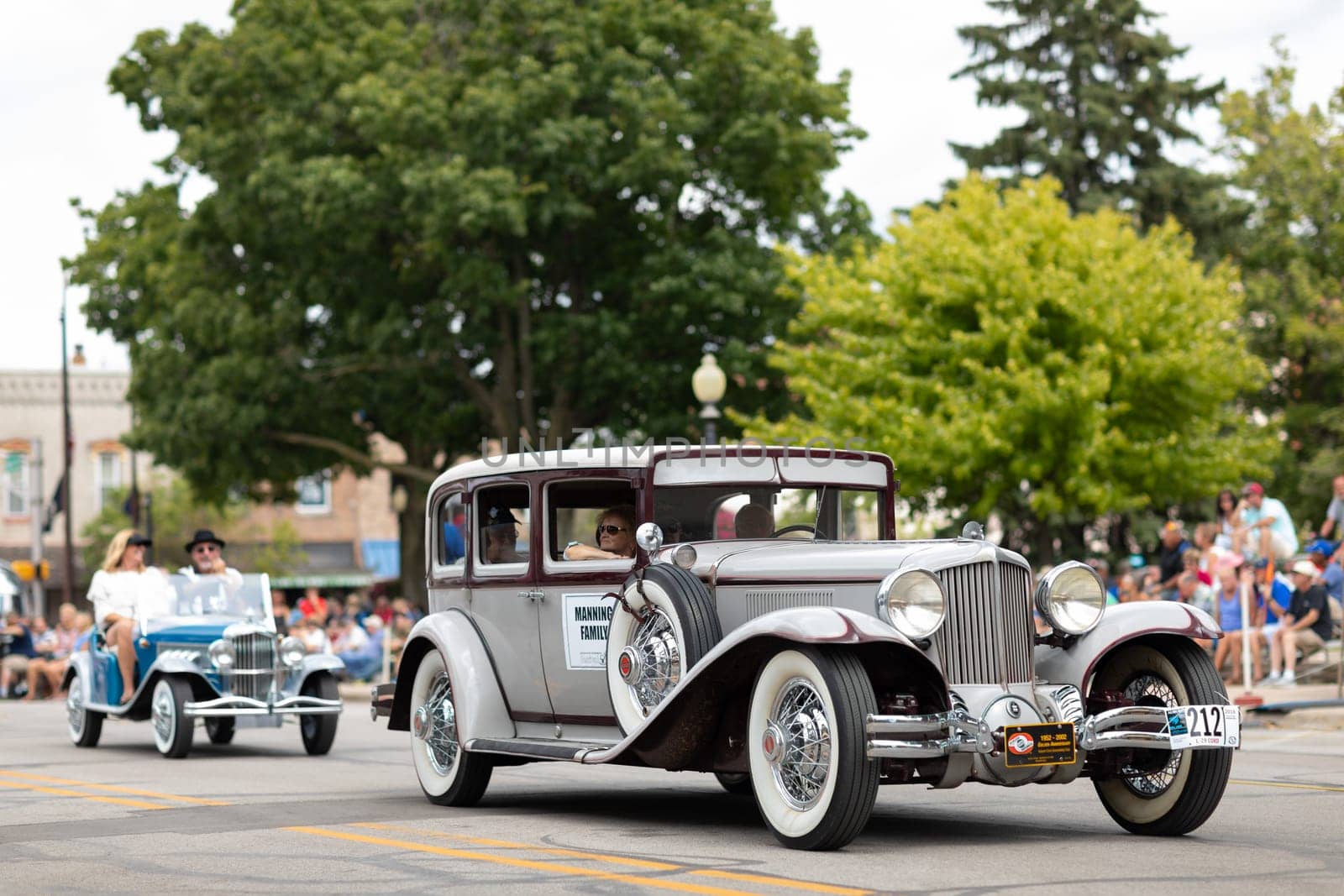 Auburn, Indiana, USA - September 9, 2018 The Auburn Cord Duesenberg Festival, A L-29 Cord classic car driving down the street during the parade